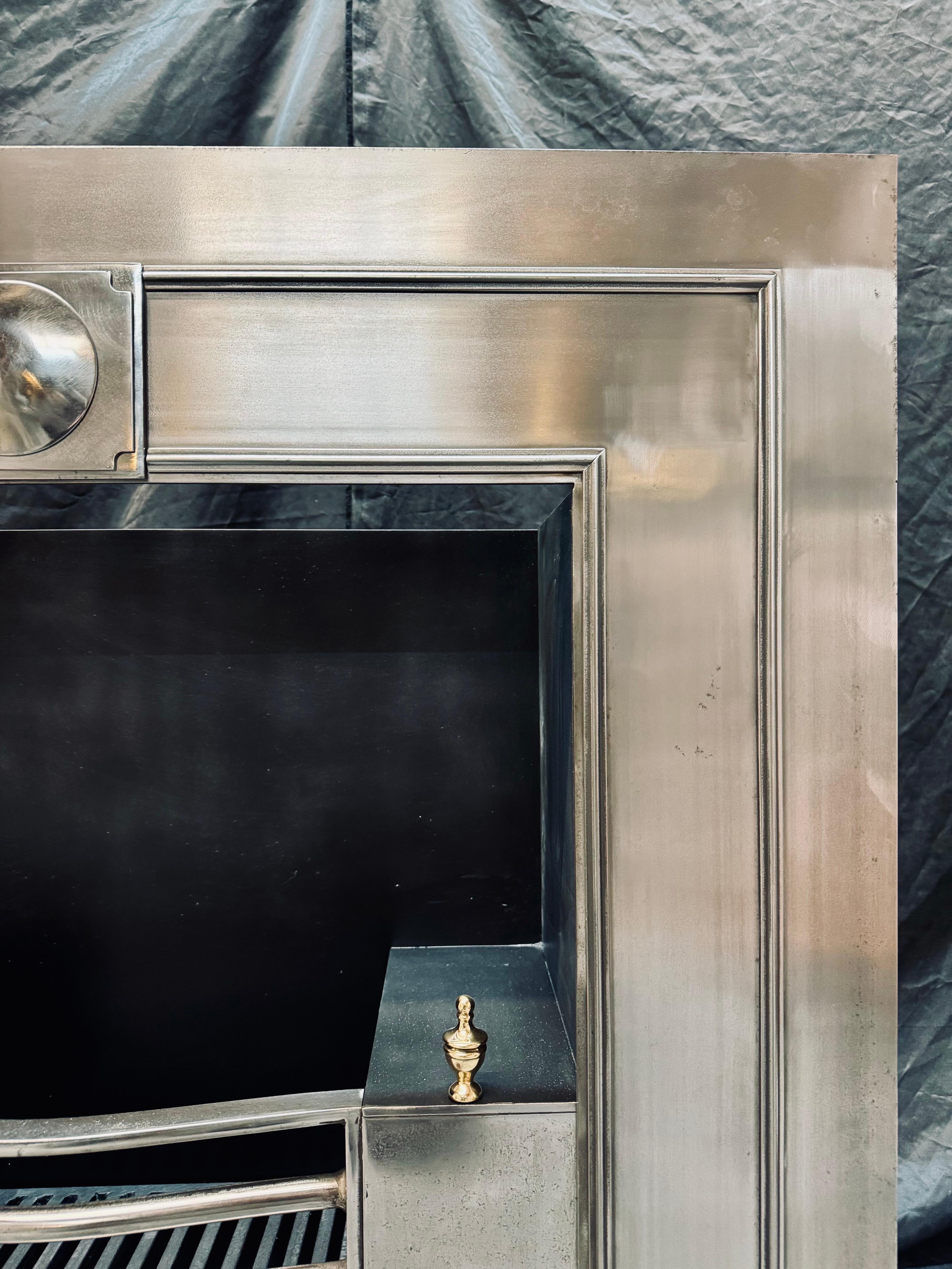 Mid-20th Century A large 19th Century Georgian Manner Polished
Steel Fireplace Insert. For Sale