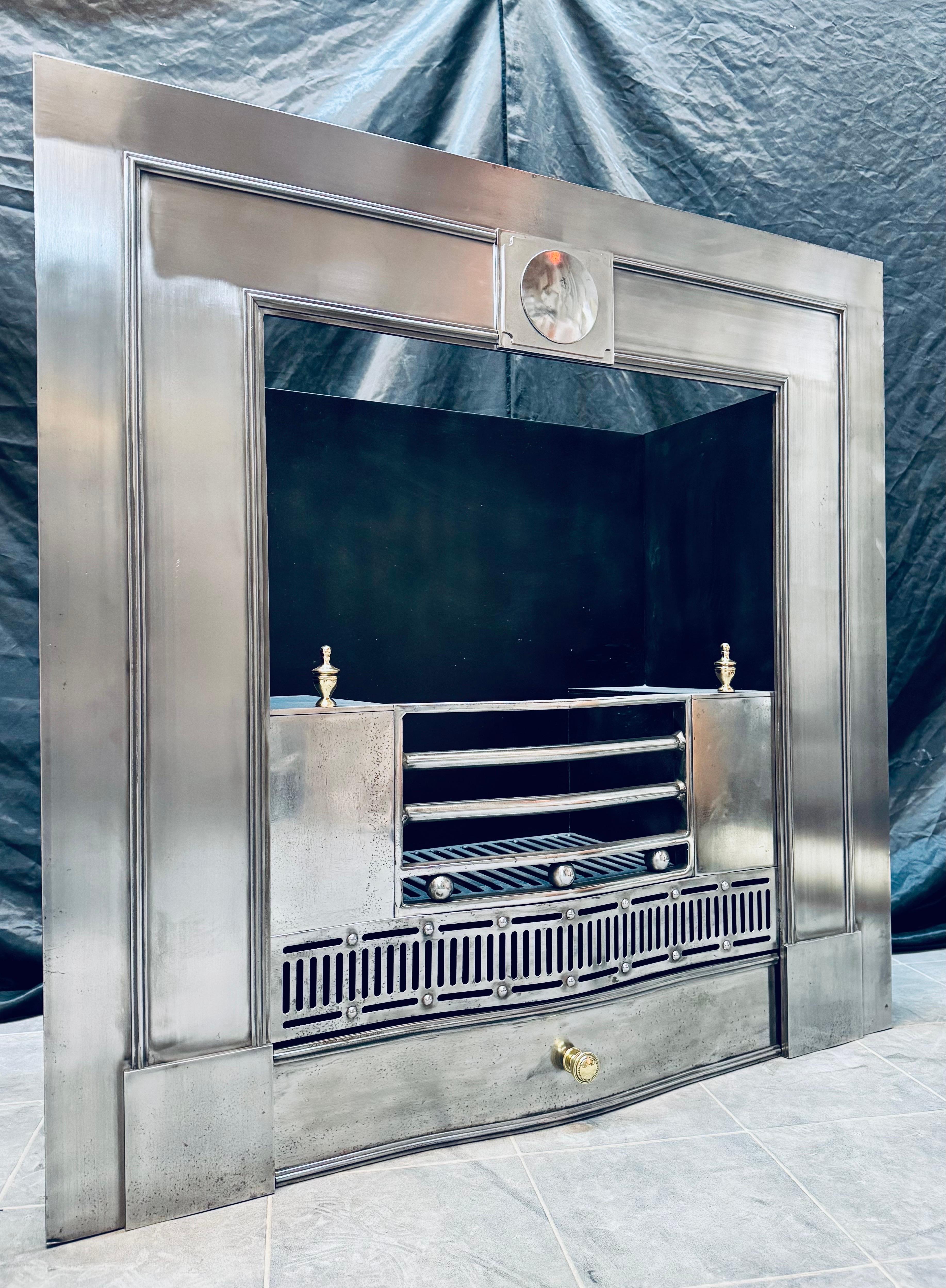 A large 19th Century Georgian Manner Polished
Steel Fireplace Insert. For Sale 1