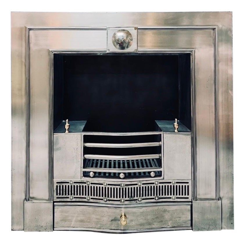 A large 19th Century Georgian Manner Polished
Steel Fireplace Insert.