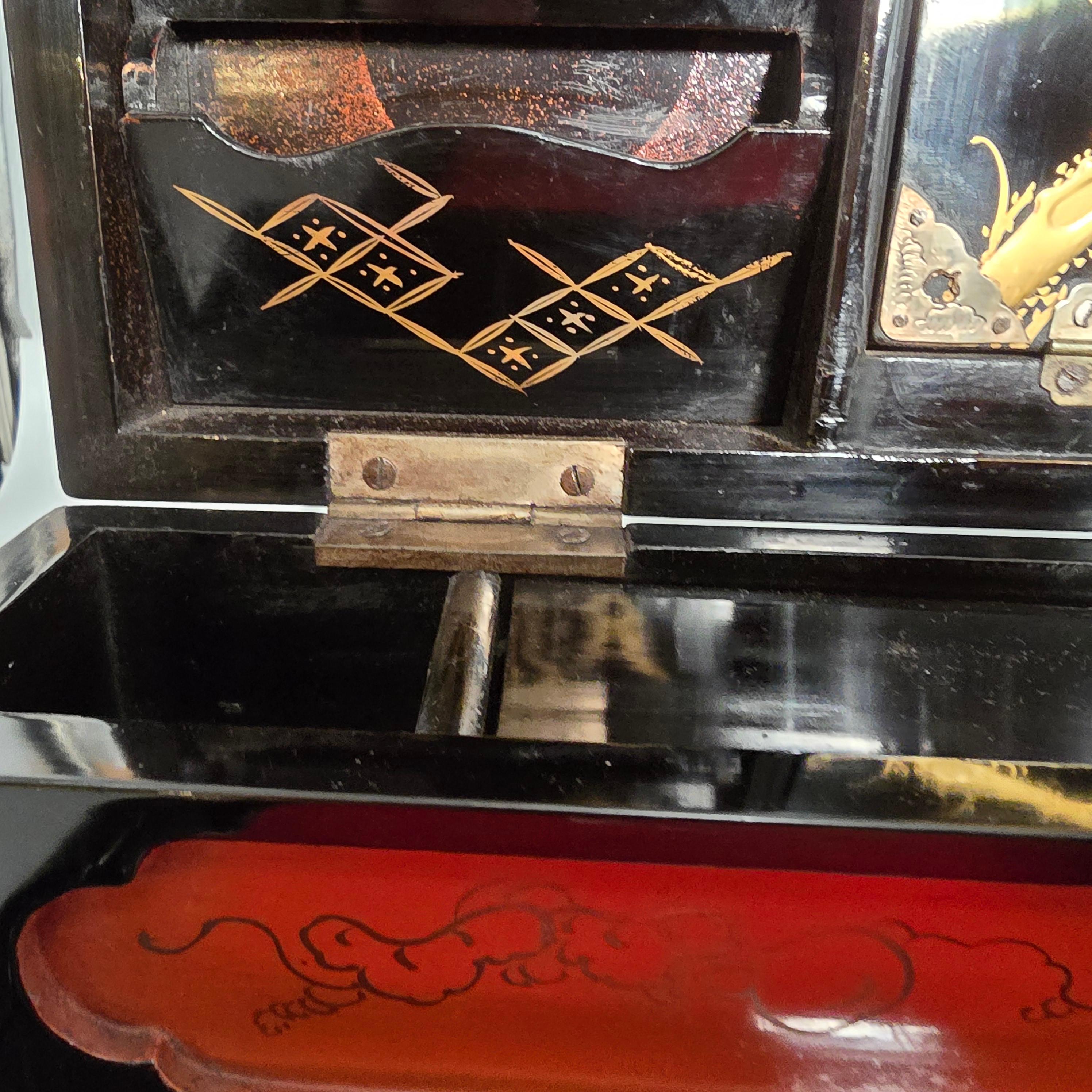 A large 19th century Japanese lacquer writing box with a secret compartment For Sale 6