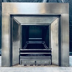 A large 19th Century Manner Polished Fireplace Insert.