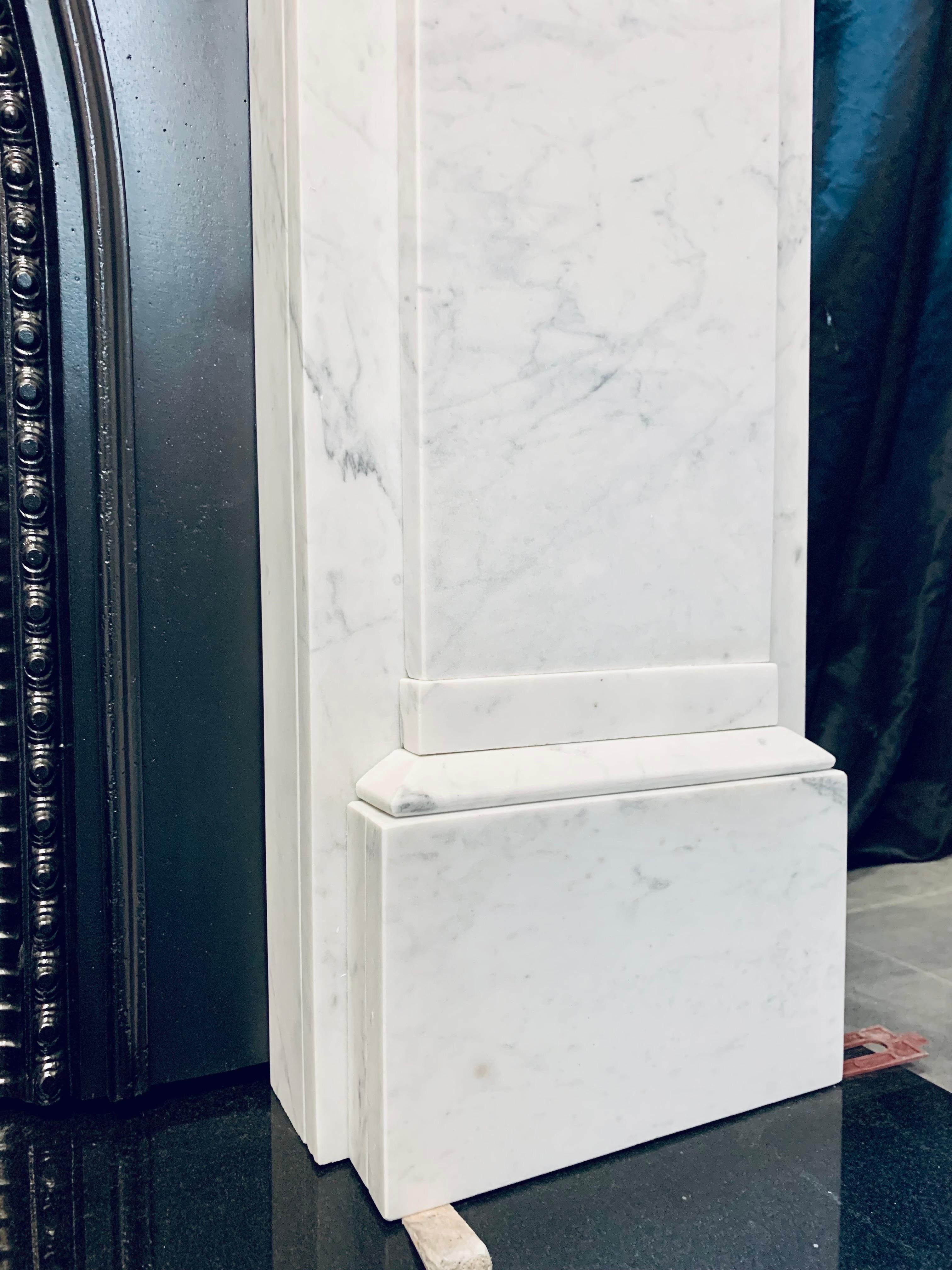 British A Large 19th Century Victorian Carrara Marble Corbeled Fireplace Surround.  For Sale
