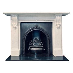 A Large 19th Century Victorian Carrara Marble Corbeled Fireplace Surround.