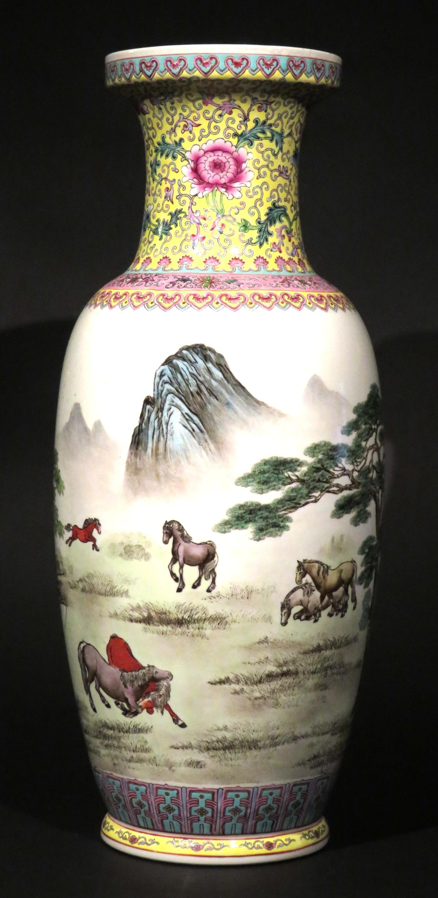 The large Jingdezhen period baluster shaped body finely decorated with hand painted enamels depicting the ‘Eight Horses of Wang Mu’ against a treed & mountainous landscape, together with rows of verses in hand painted calligraphy, the base & neck
