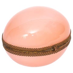 A Large 20th C. French Ormolu Mounted Pink Opaline Egg Form Covered Box