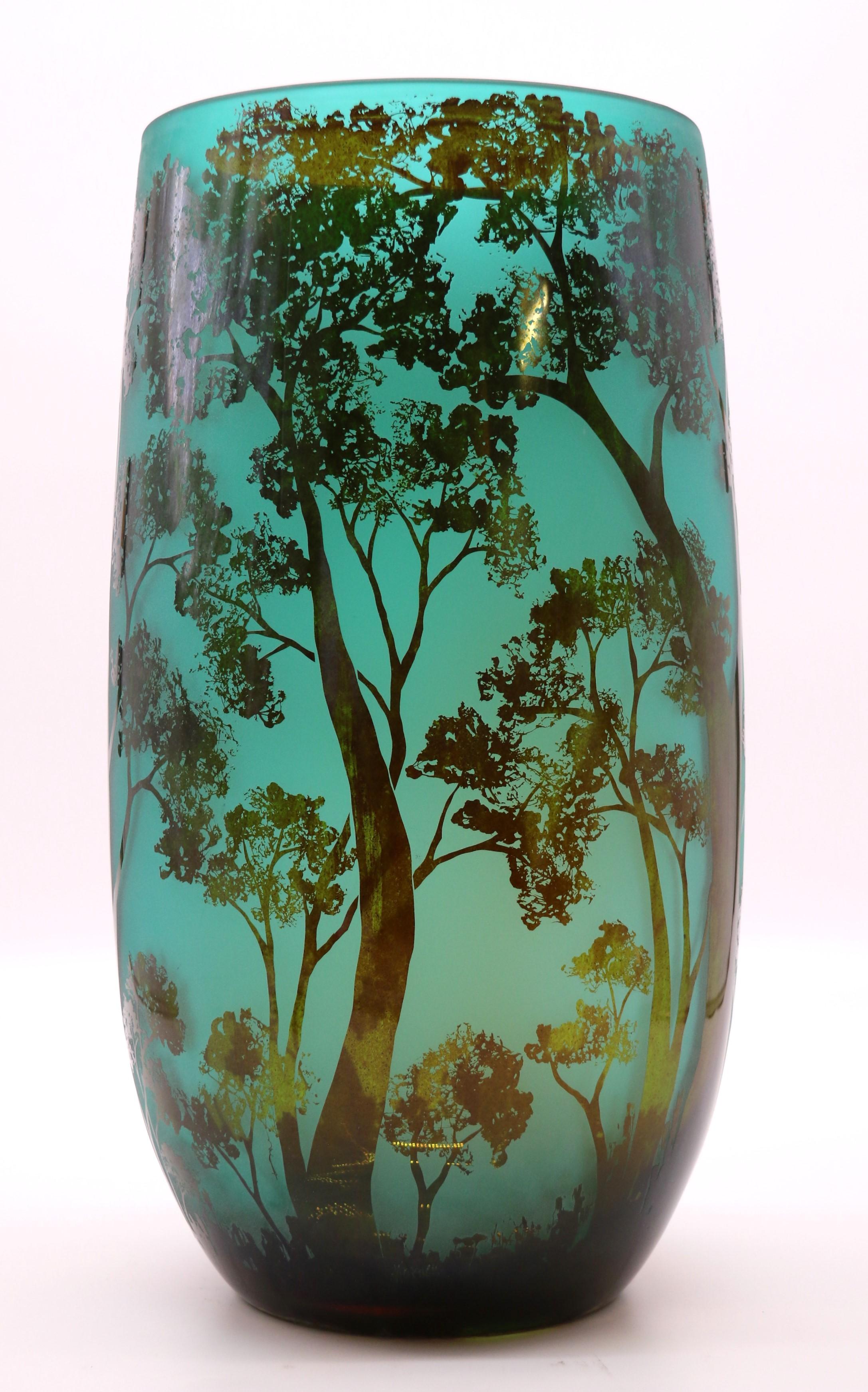 A large 20th century cameo glass vase decorated with an intricate woodland scene 9