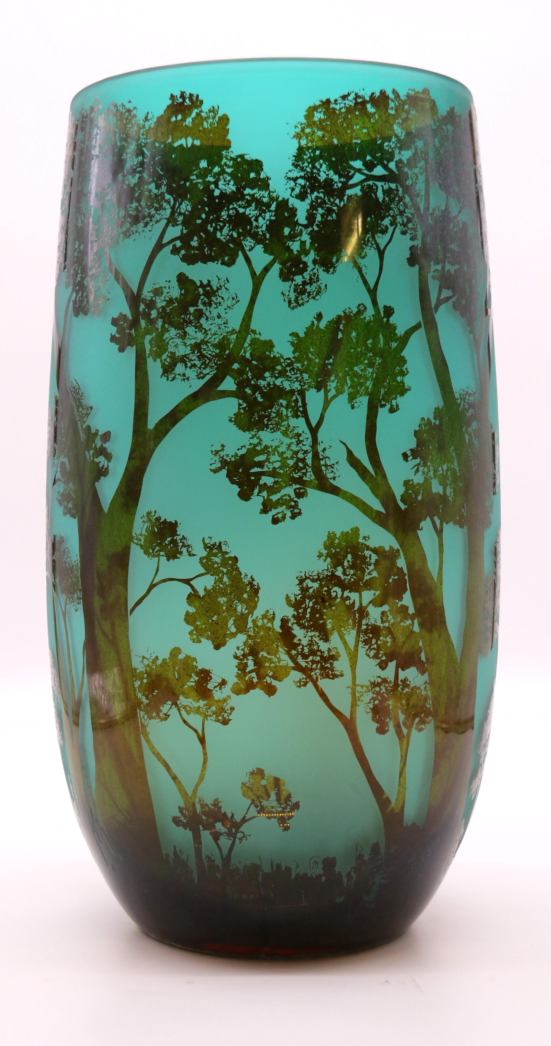 A large 20th century cameo glass vase decorated with an intricate woodland scene 1