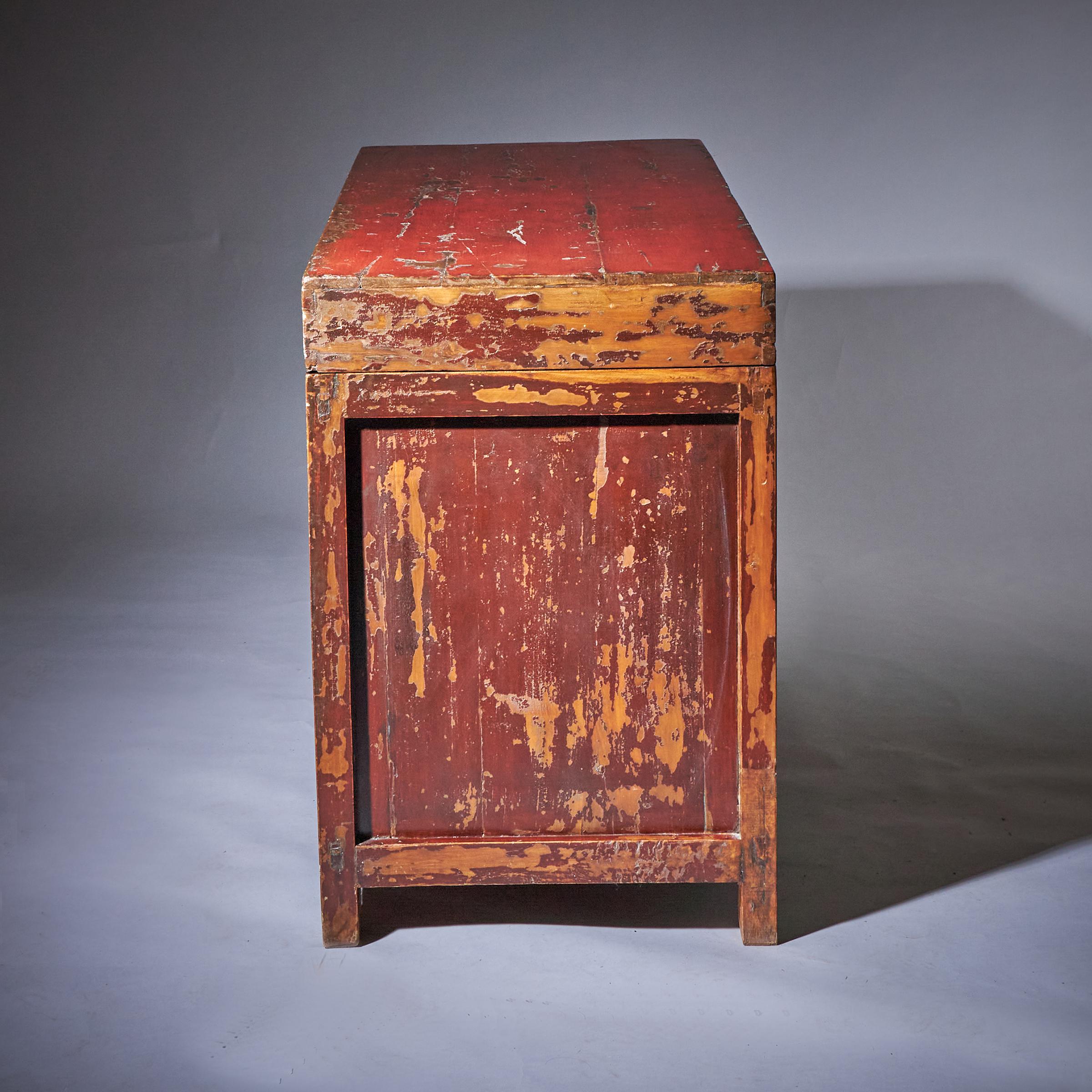 Chinese A Large 20th Century Red Japanned and Hand Decorated Tibetan Storage Chest For Sale