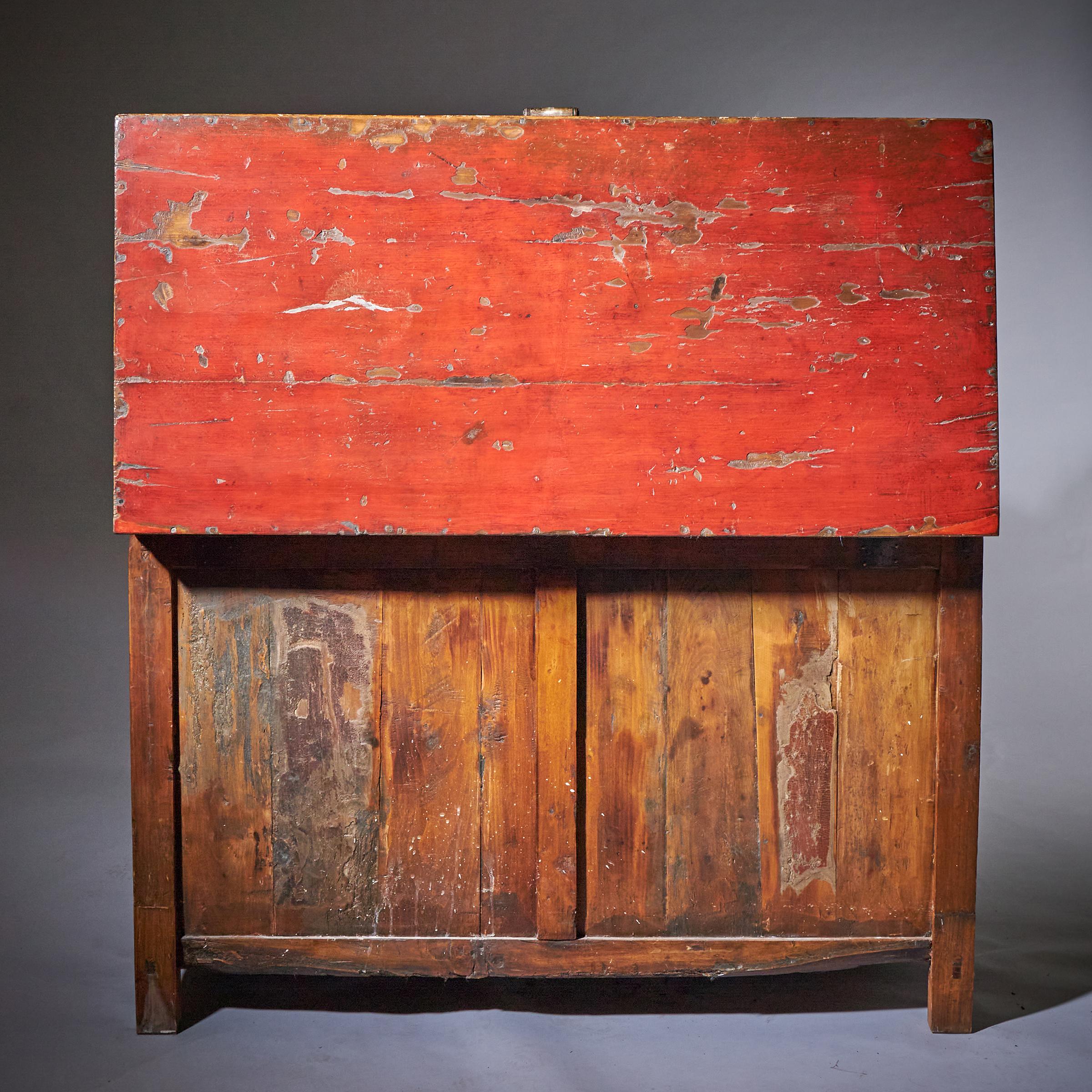 Hardwood A Large 20th Century Red Japanned and Hand Decorated Tibetan Storage Chest For Sale