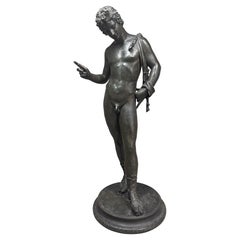 A large 24-inch high 19th century Grand Tour bronze model of Narcissus