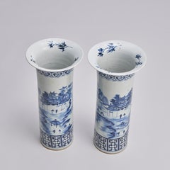A large (44cm in height) pair of blue and white sleeve vases