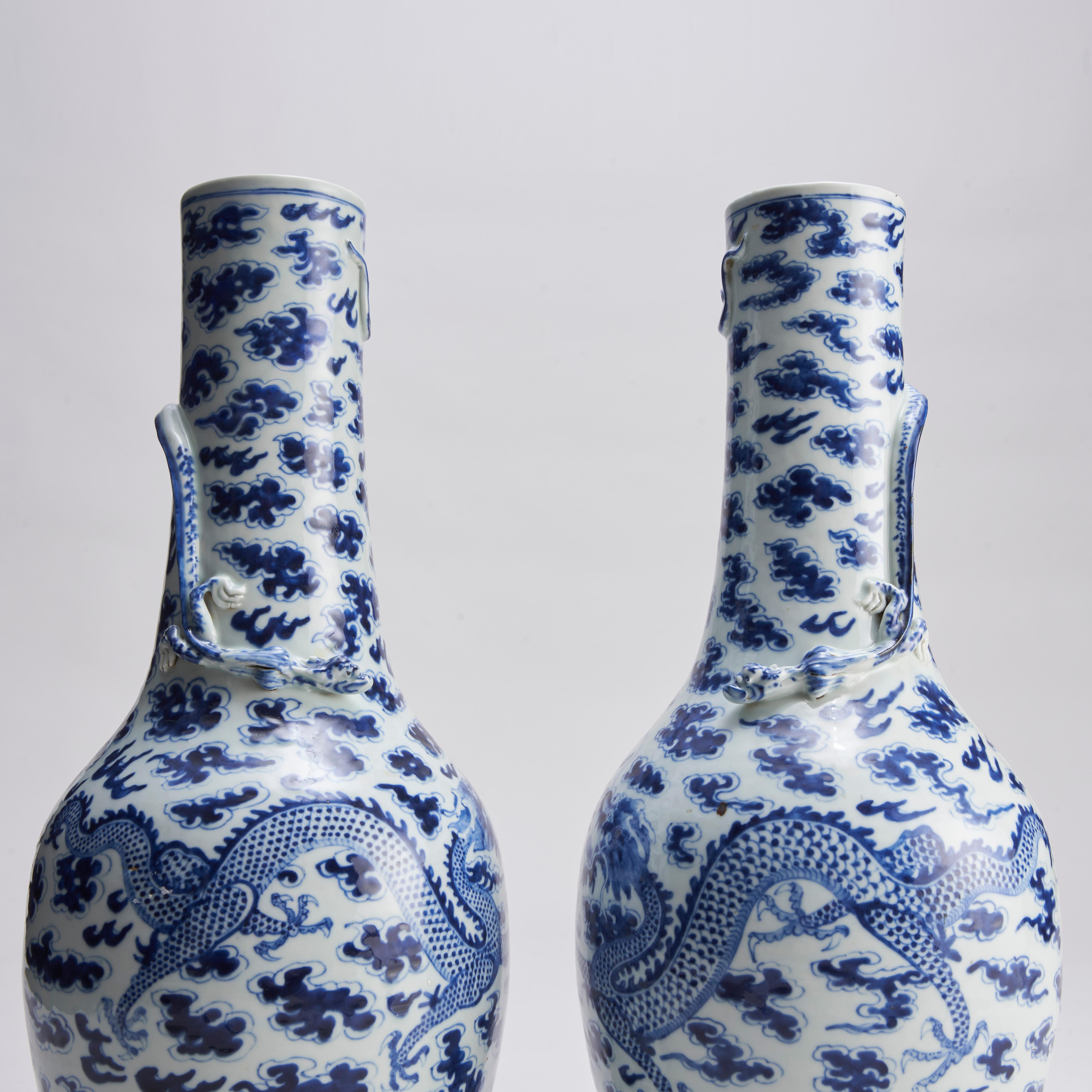 Porcelain A large (61cm in height) pair of 19th Century Chinese porcelain blue and w For Sale
