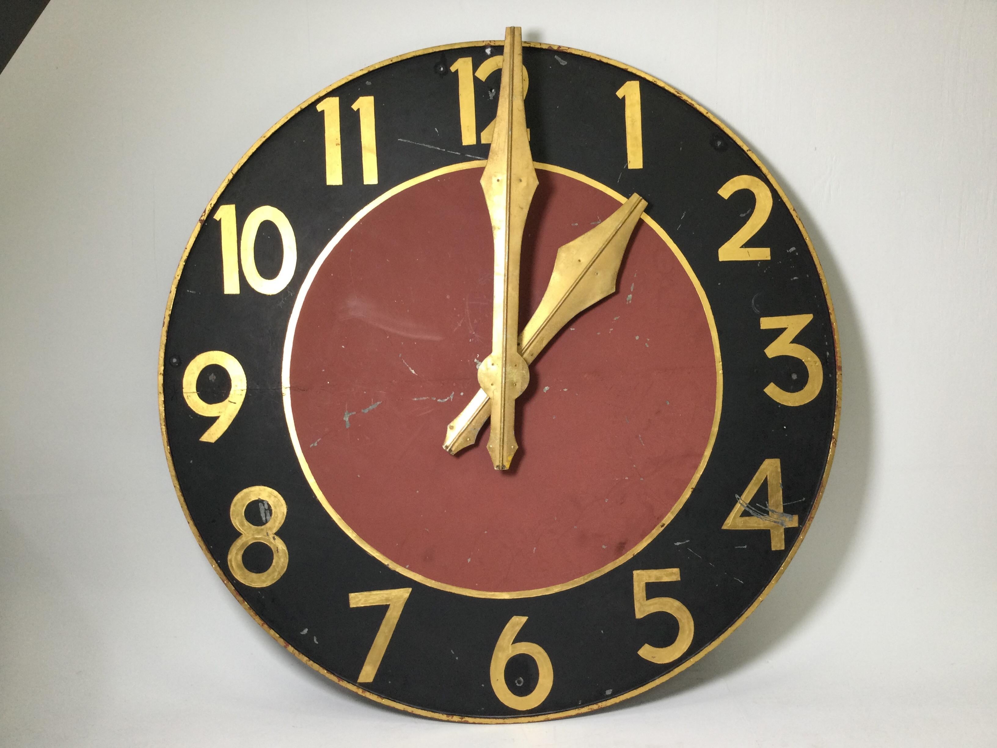 A large 72 inch diameter acretectual clock face in painted and gilt steel. The clock is for decorative purposes and is not running. Vey sturdy and heavy.