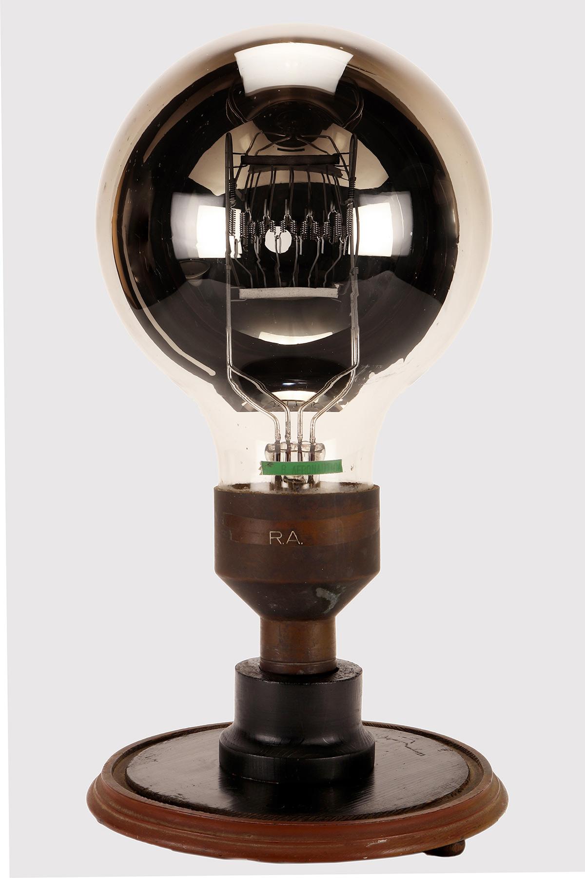A Large airport light bulb of the RA (Regia Aereonautica).
Mounted on a round painted wooden base. Italy circa 1930.