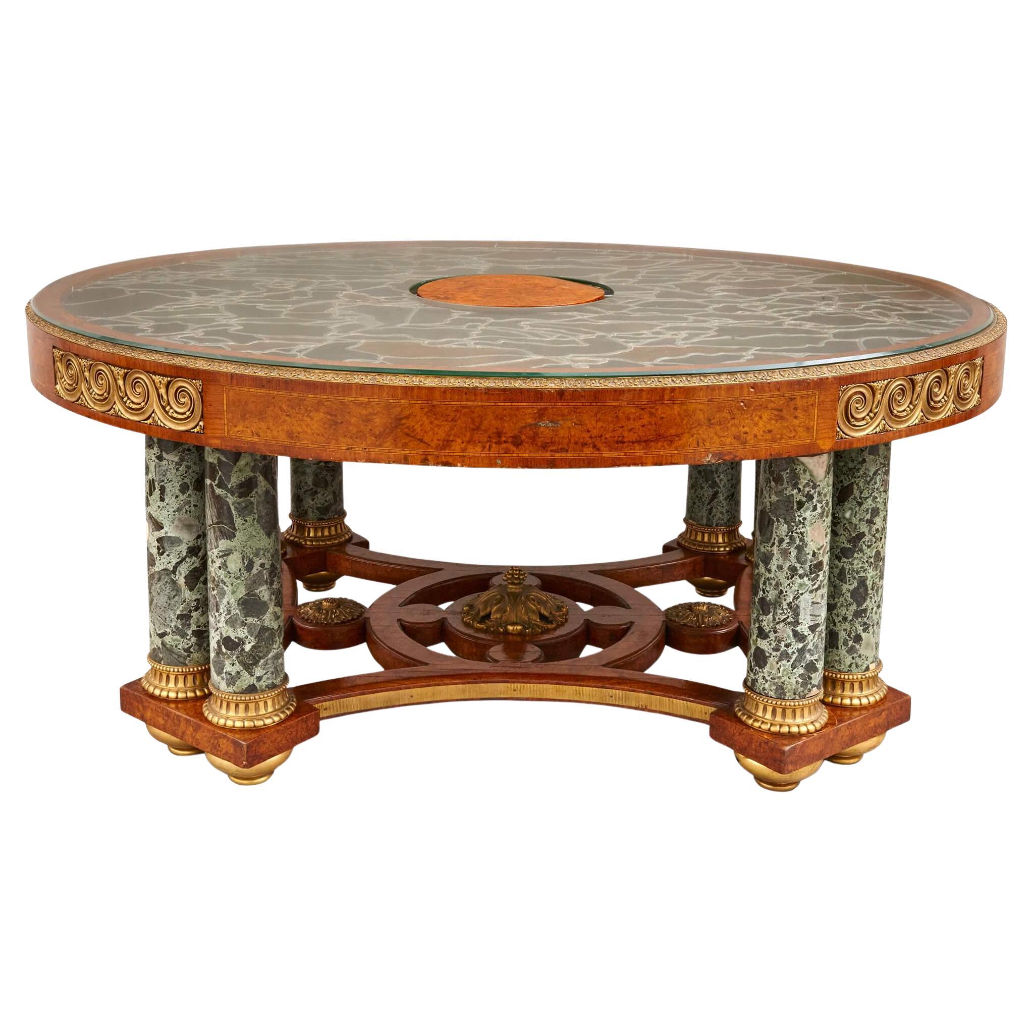 A large amboyna, stained glass, marble, and ormolu mounted centre table For Sale
