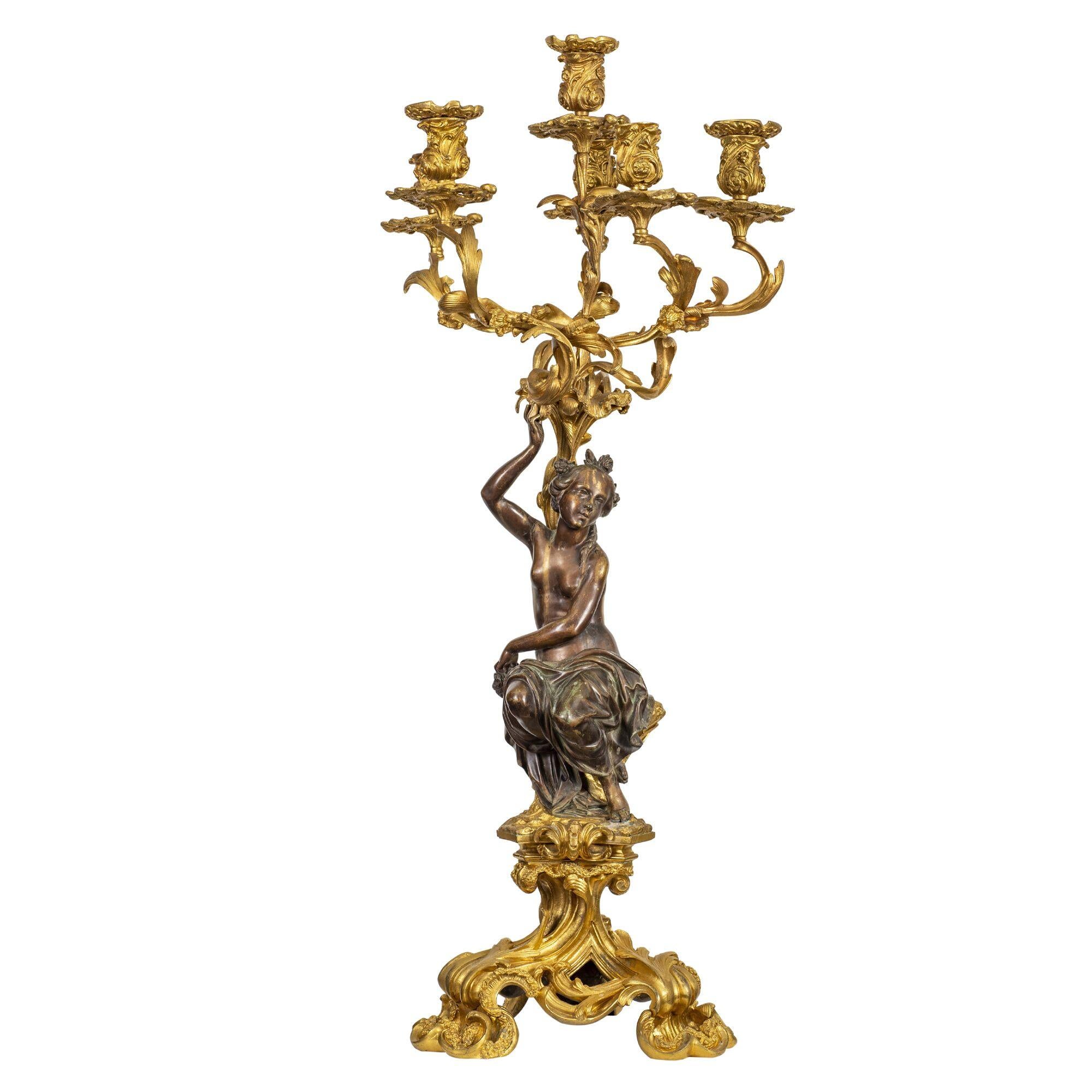 A large and fine pair of Louis XVI patinated and gilt bronze figural six-light candelabra, in the manner of Falcone,
France, circa 1880,
Measures: Height 31 in. (787.4 mm.)
Width 12 in. (304.8 mm.)
Depth 12 in. (304.8 mm.).