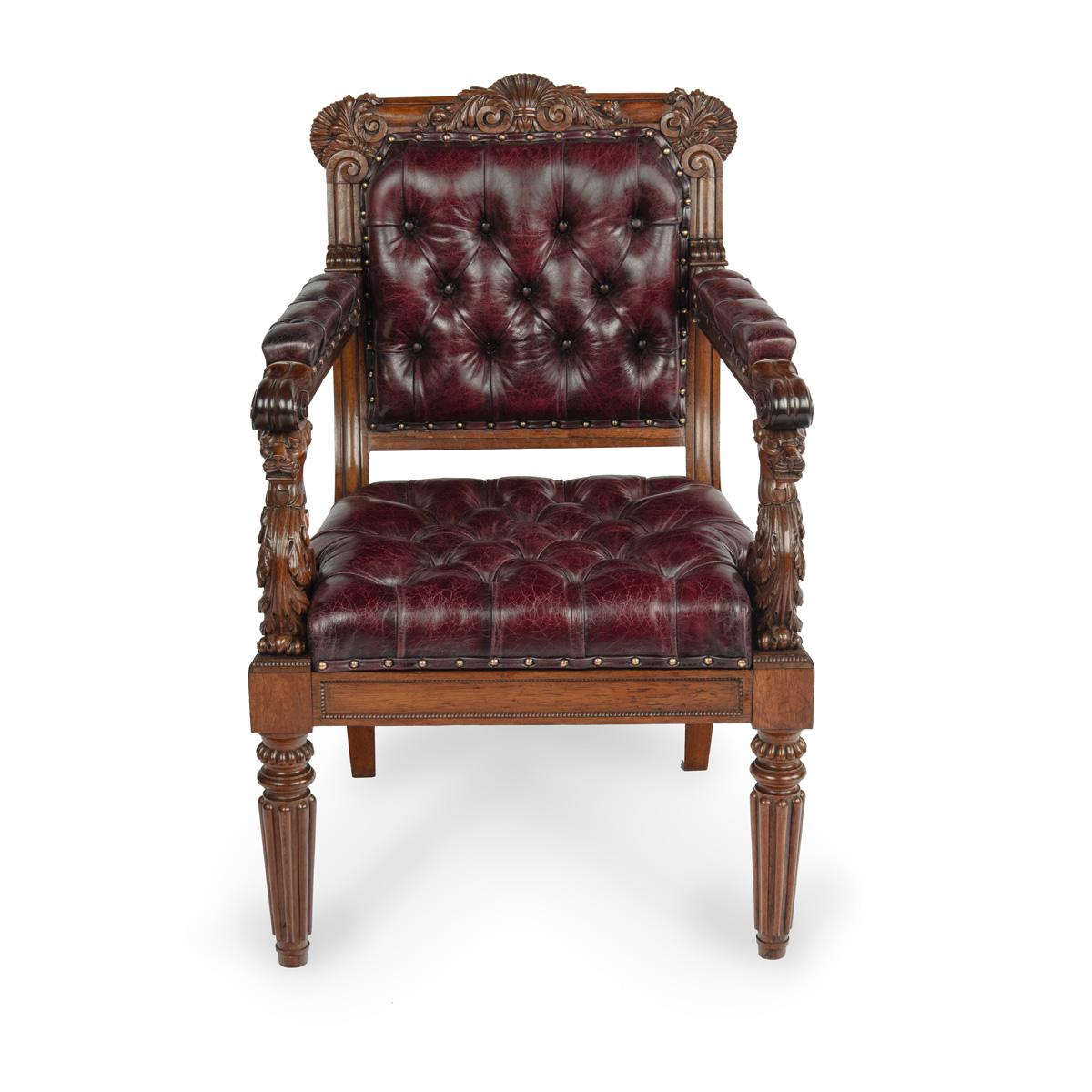 Une grande et belle paire de fauteuils Regency en bois de rose, chacun avec un dossier carré et une barre d'appui sculptée de coquilles et de volutes, des supports d'accoudoir en forme de tête de lion et des pieds tournés et godronnés, le dossier,