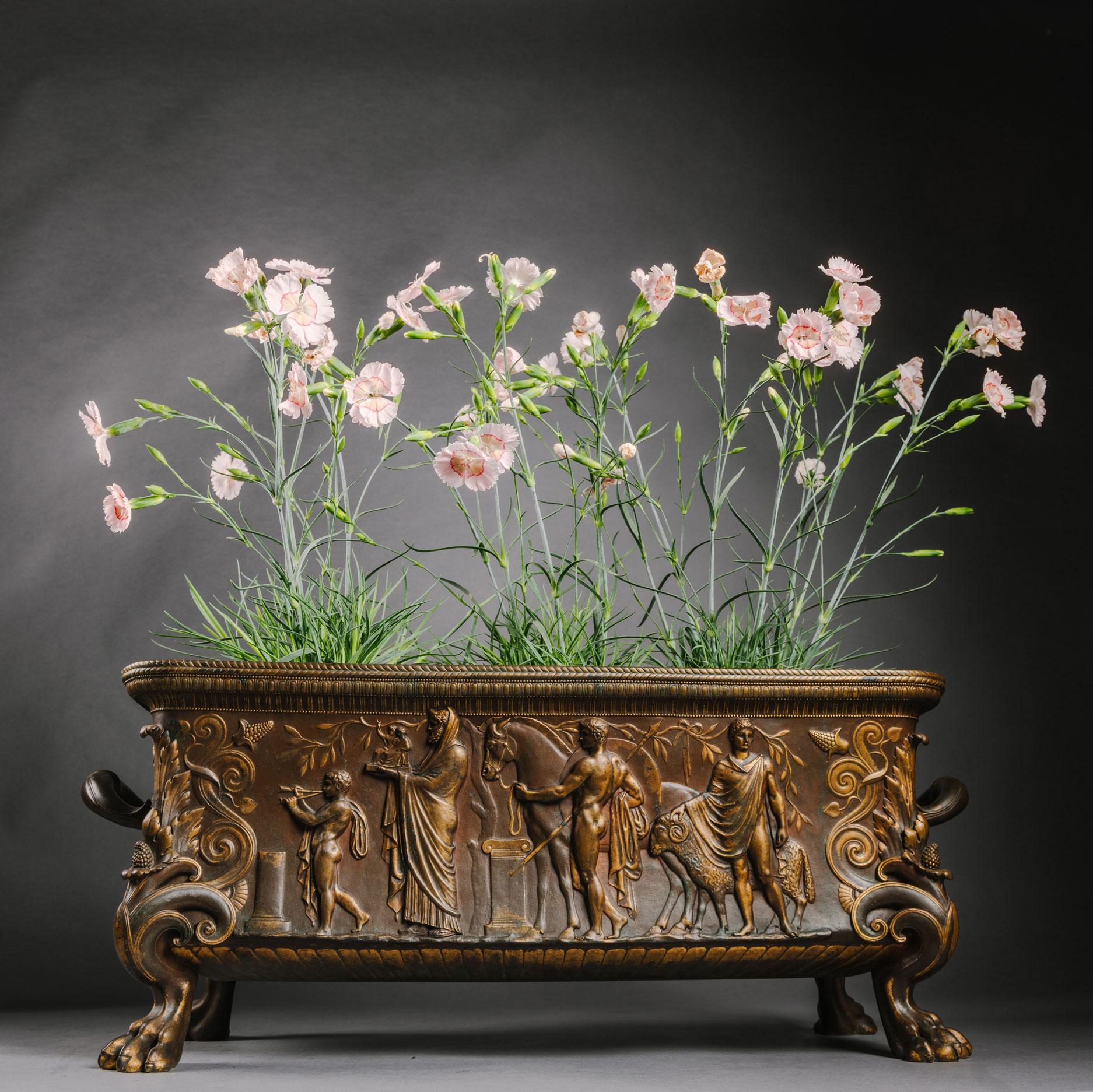 A large and finely cast neo-grec gilt and patinated bronze jardinière by Ferdinand Barbedienne.

Signed 'F. BARBEDIENNE'.

This rare Jardinière or planter is a fine example of the 'Neo-Grec' or ‘Pompeian’ style modelled after the antique, which