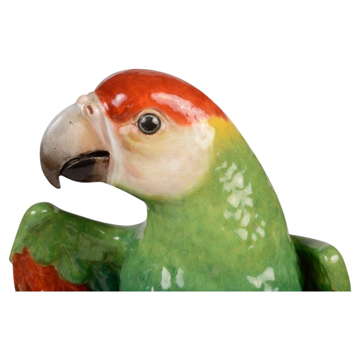 A large and impressive and wonderfully colourful, naturalistically modelled parrots, perched on tree stump. 
Blue crossed swords to the underside. Measure: 43cm high.  

Batch 71 61800 TAKZN