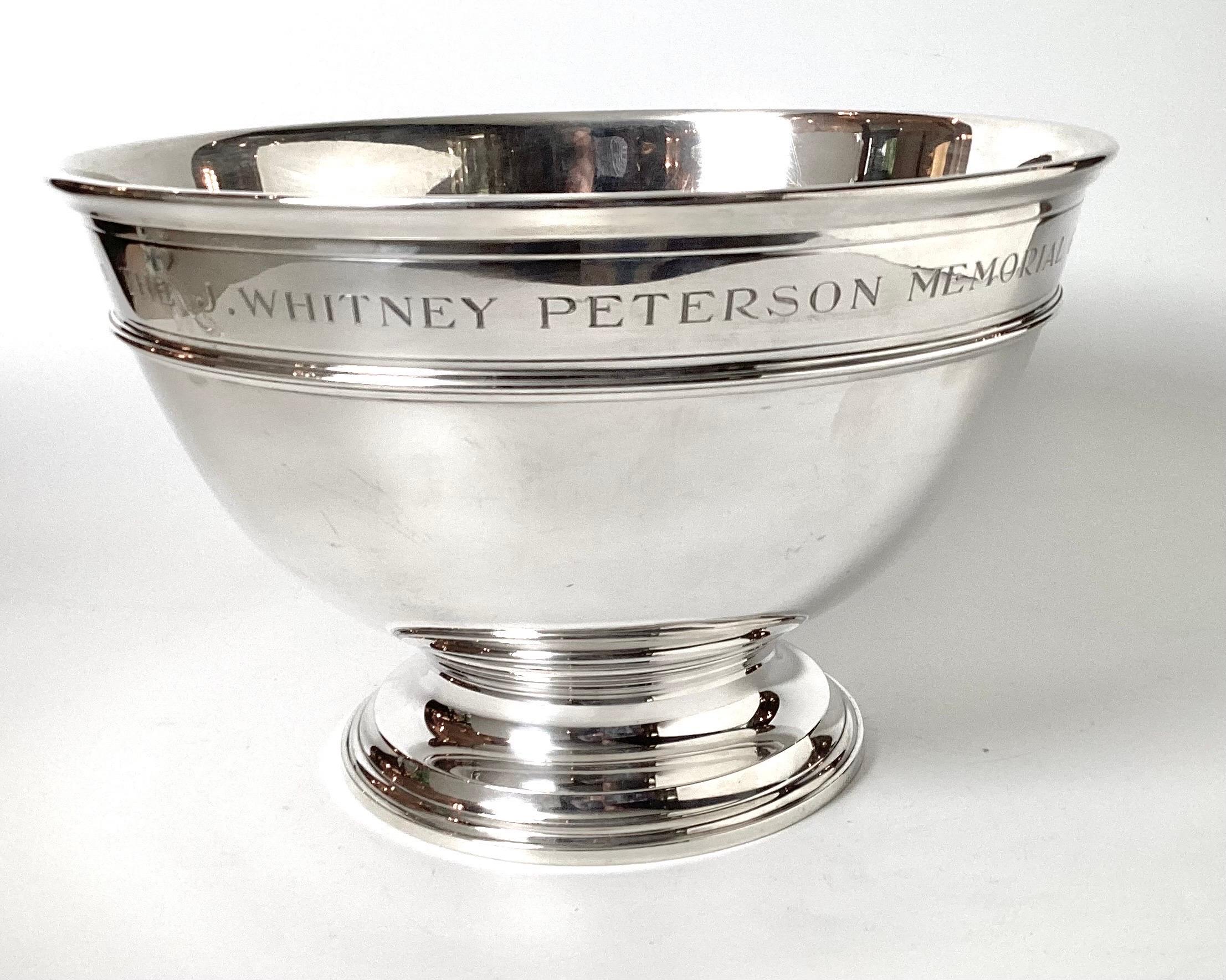 An impressive and heavy sterling silver punch bowl by Tiffany and Co, designed by William Thomas Lusk, 1950's  The elegant styled large bowl is 13 inches in Diameter, 8.5 inches tall and weighs 82 oz.  The bowl with the engraving 