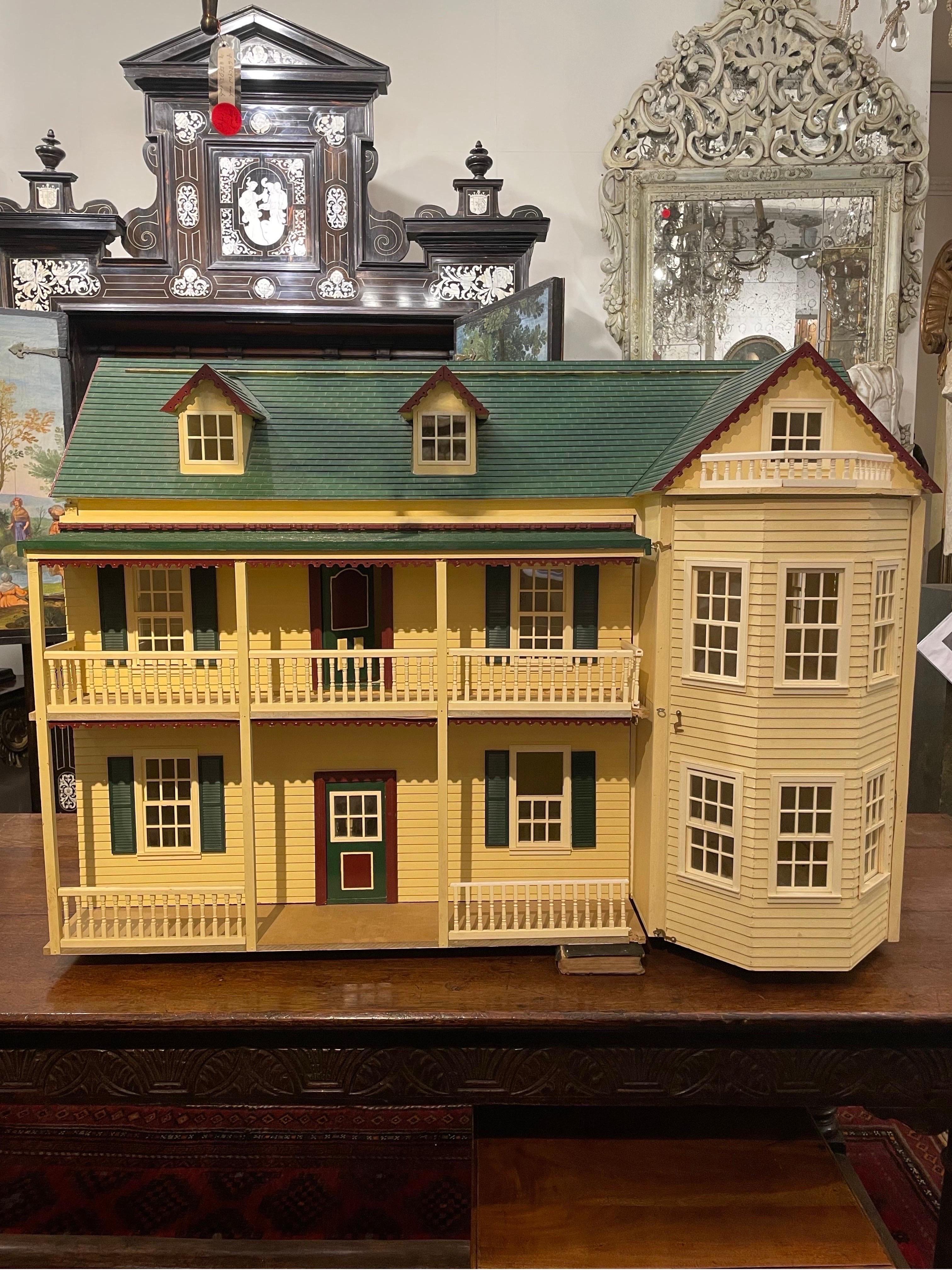 A Large and Impressive Vintage Double Storey Doll House, 20th Century

Height: 84 cm Width: 118 cm Depth: 63 cm

Provenance: Private Australian Collection.