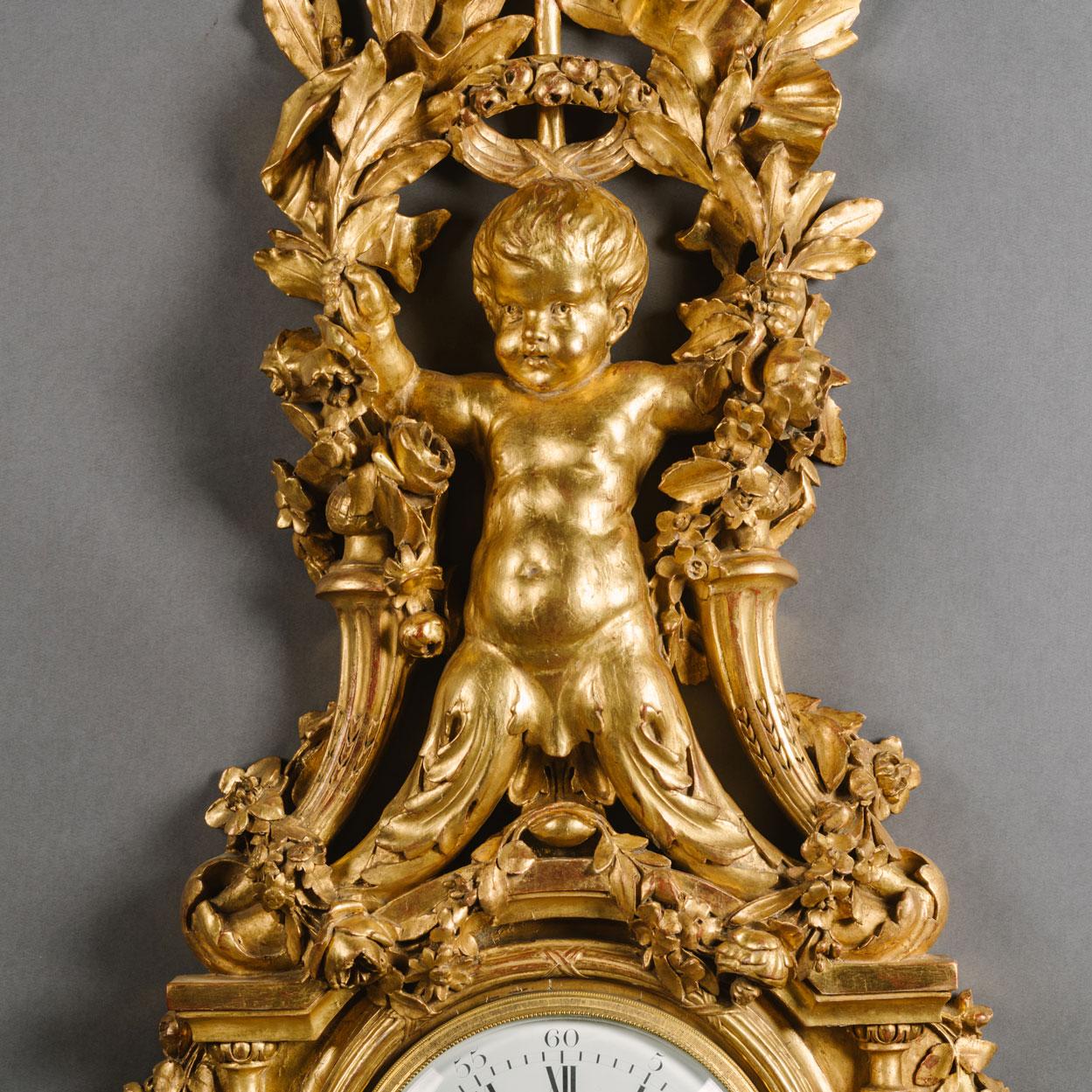 Large and Louis XVI Style Carved Giltwood Clock and Barometer Set In Good Condition For Sale In Brighton, West Sussex