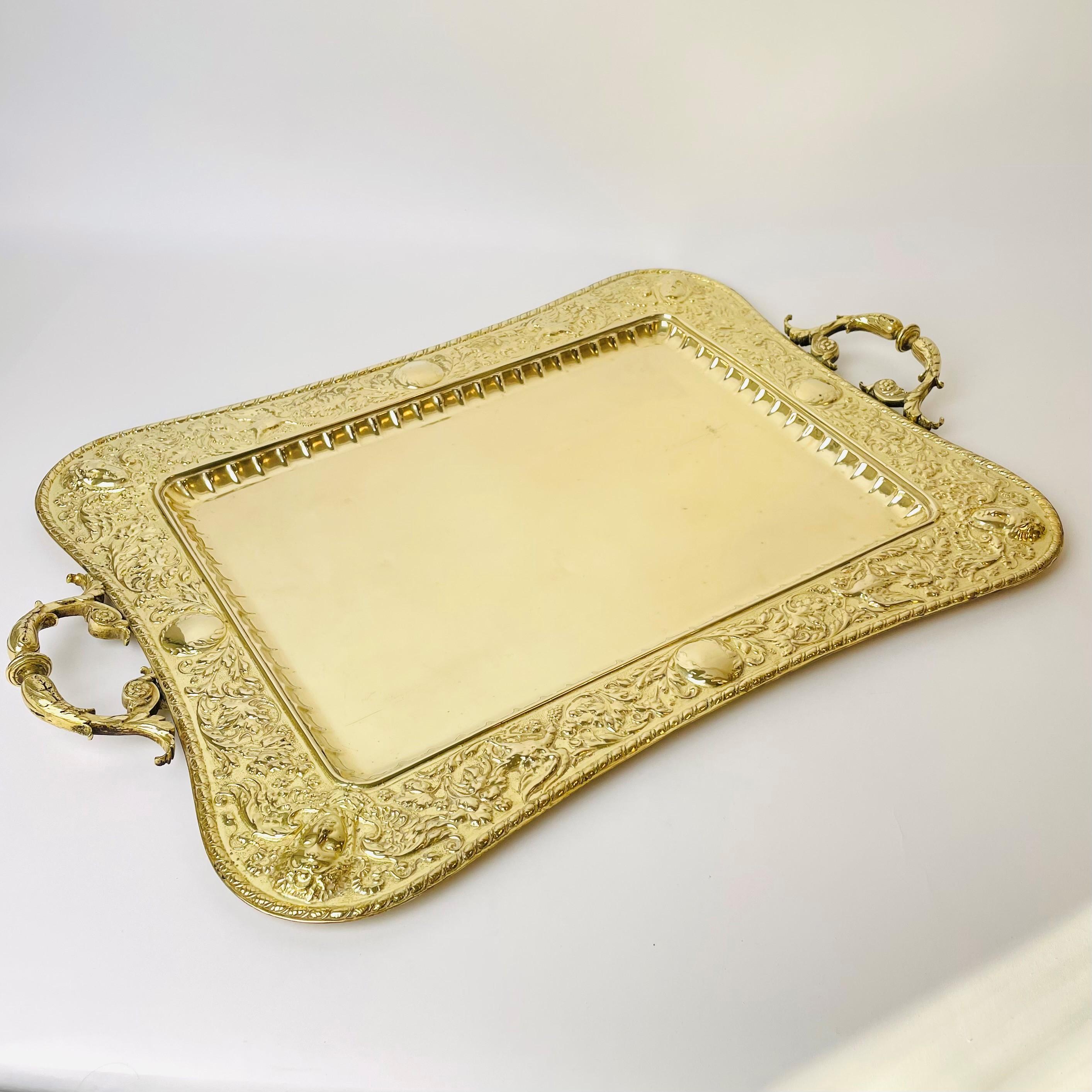 A large and magnificent brass Serving Tray. Heavy and of high quality. Made in the late 19th Century. 

The tray has minor bumps and scratches (see pictures), but for its age in very good condition.


Wear consistent with age and use.