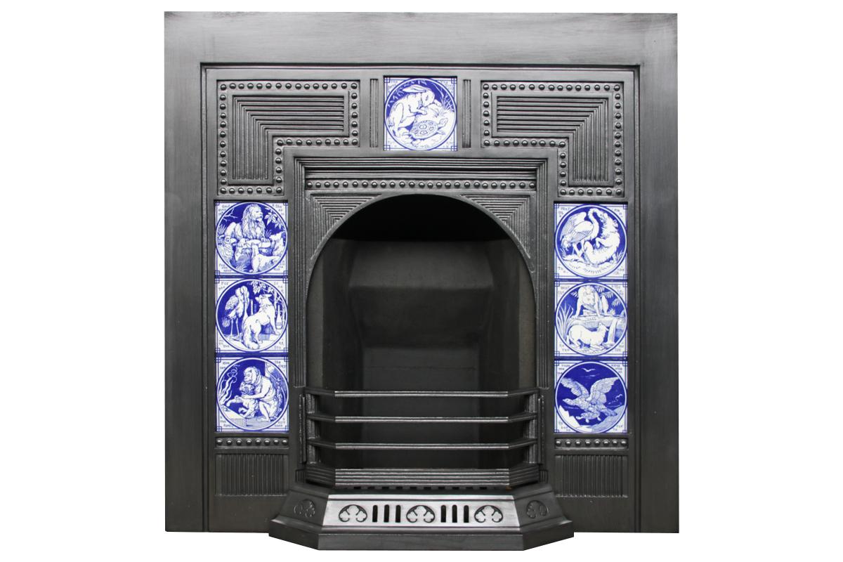 A large and unusual 19th Century Victorian cast iron and tiled fireplace grate. Unusual because it is totally flat, rather than the typical insert with where the tiles are chamfered inwards. This insert is complete with a wonderful set of seven