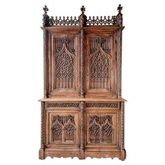 Antique Large and Very Richly Carved 19th Century French Walnut Gothic Revival Armoire