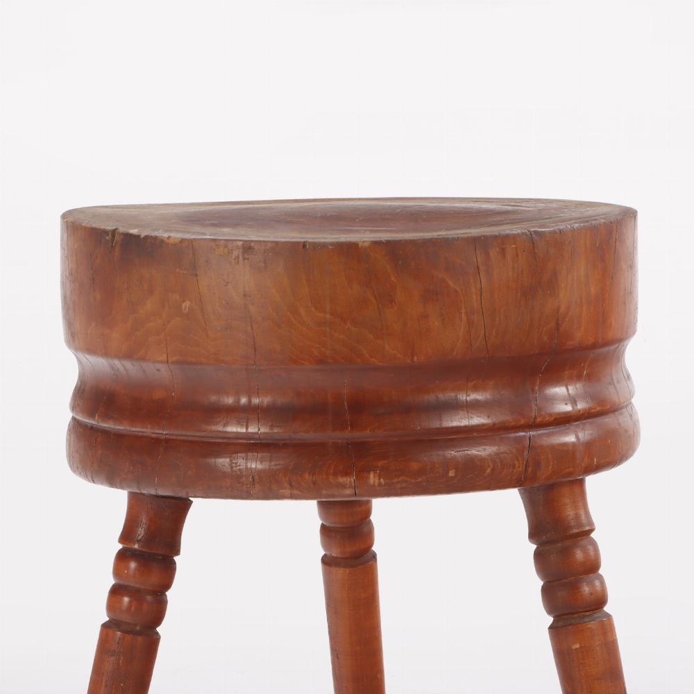 Primitive A large antique butcher block table having a natural circular top. For Sale