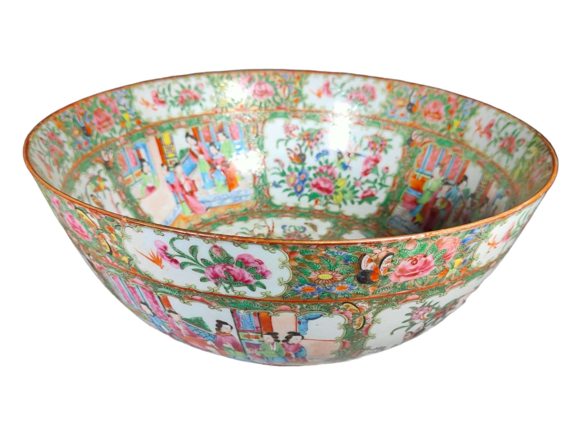 With Rose Medallion (Rose Family) decoration. The central cartridge of the basin represents a court scene. The inner and outer walls of the bowl have multiple cartouches which each alternate between scenes of people and scenes of flora/fauna. The