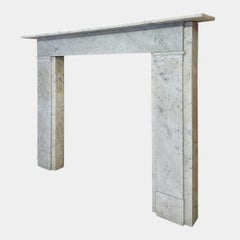A large Antique English Carrara Marble Fireplace Mantel