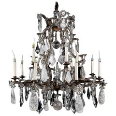 Grand lustre en fer et cristal de roche de style Antiquités françaises Bagues