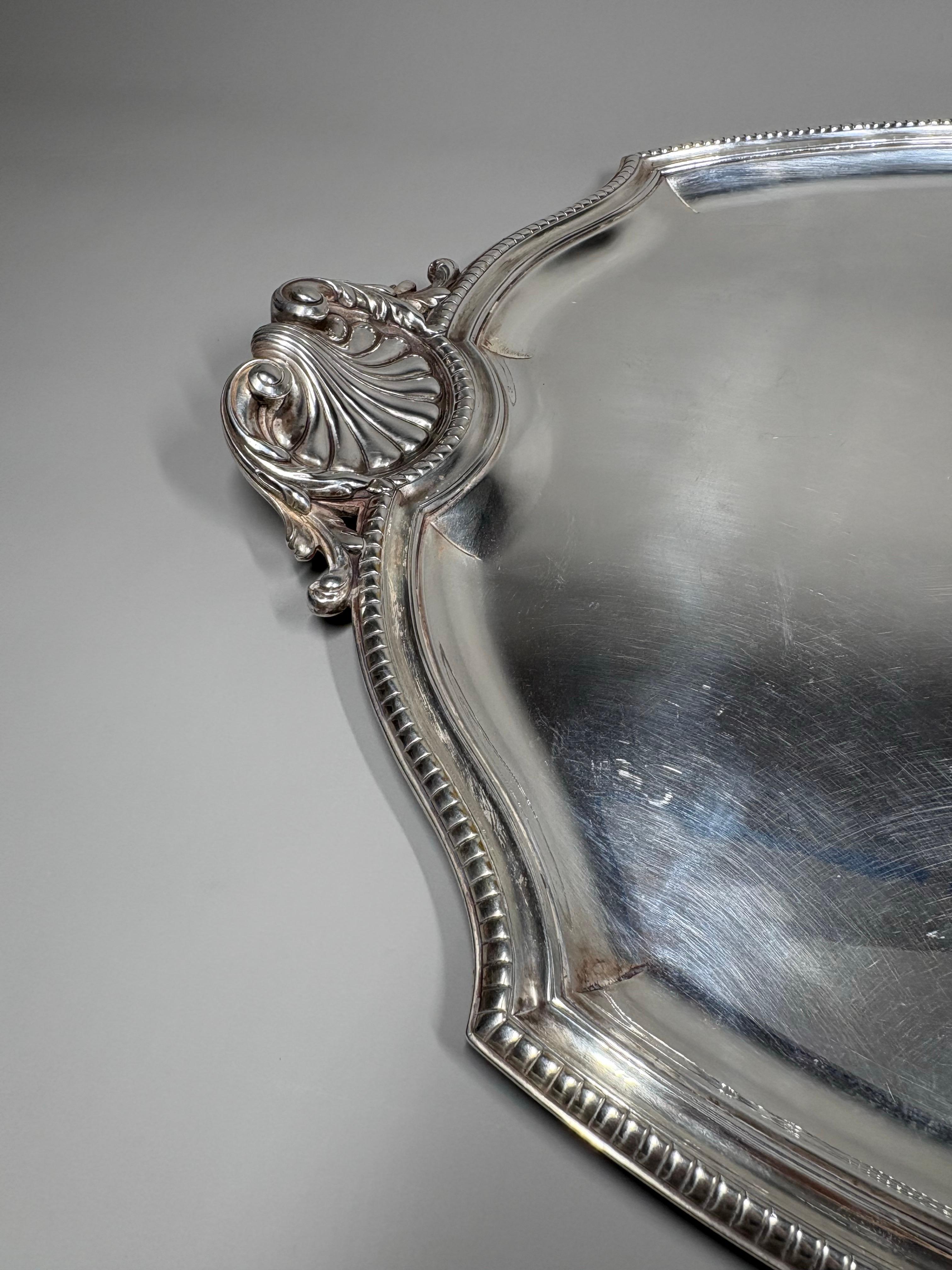 Inizio XX secolo A large antique French Rococo style silvered brass serving tray in vendita