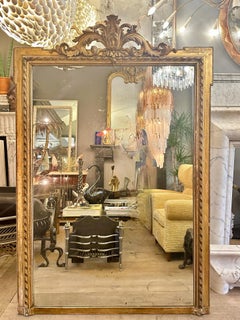 A large Antique Gold Gilt French Louis XVI Style Mirror