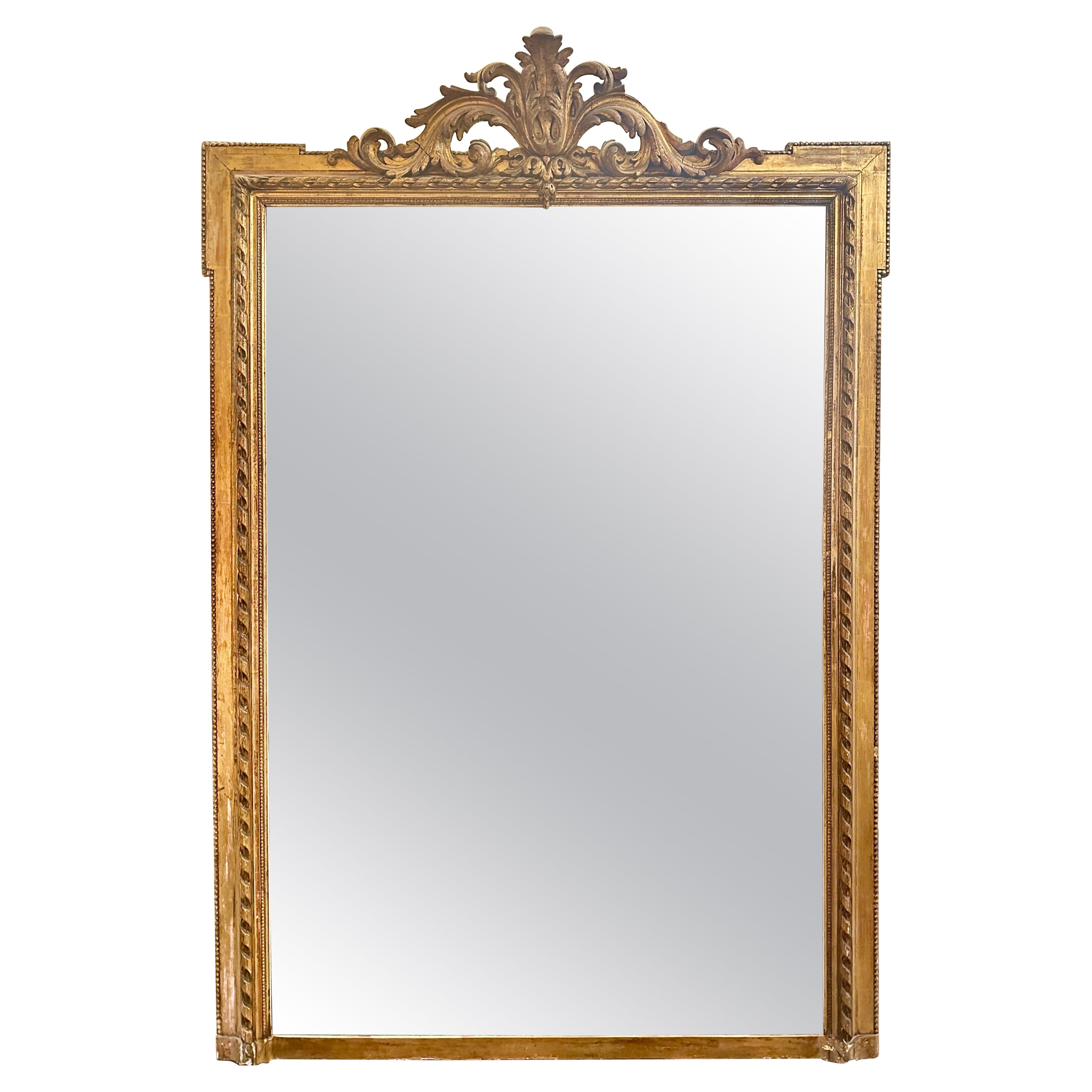 A large Antique Gold Gilt French Louis XVI Style Mirror