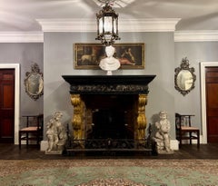 A large antique late 17th century Italian Baroque period marble fireplace/mantel