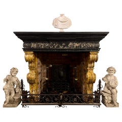 A large antique late 17th century Italian Baroque period marble fireplace/mantel