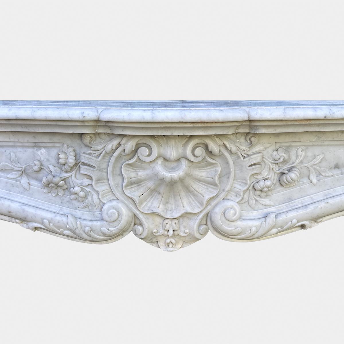 Hand-Carved A large Antique Louis XV French Rococo Carved Marble Fireplace Mantel For Sale