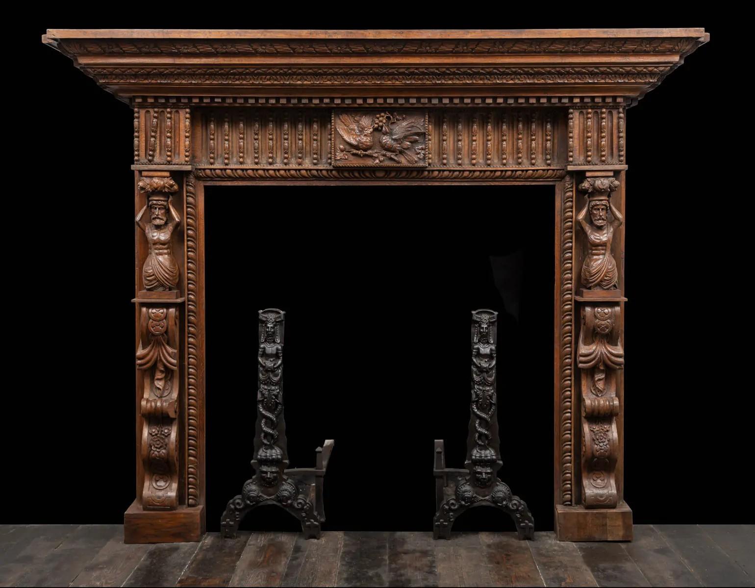 Hand-Carved A large antique profusely carved oak fireplace surround in the Jacobean style For Sale