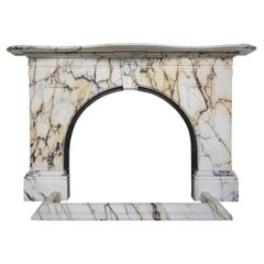 Large Used Victorian Arched Fire Surround in Striking Pavonazzo Marble