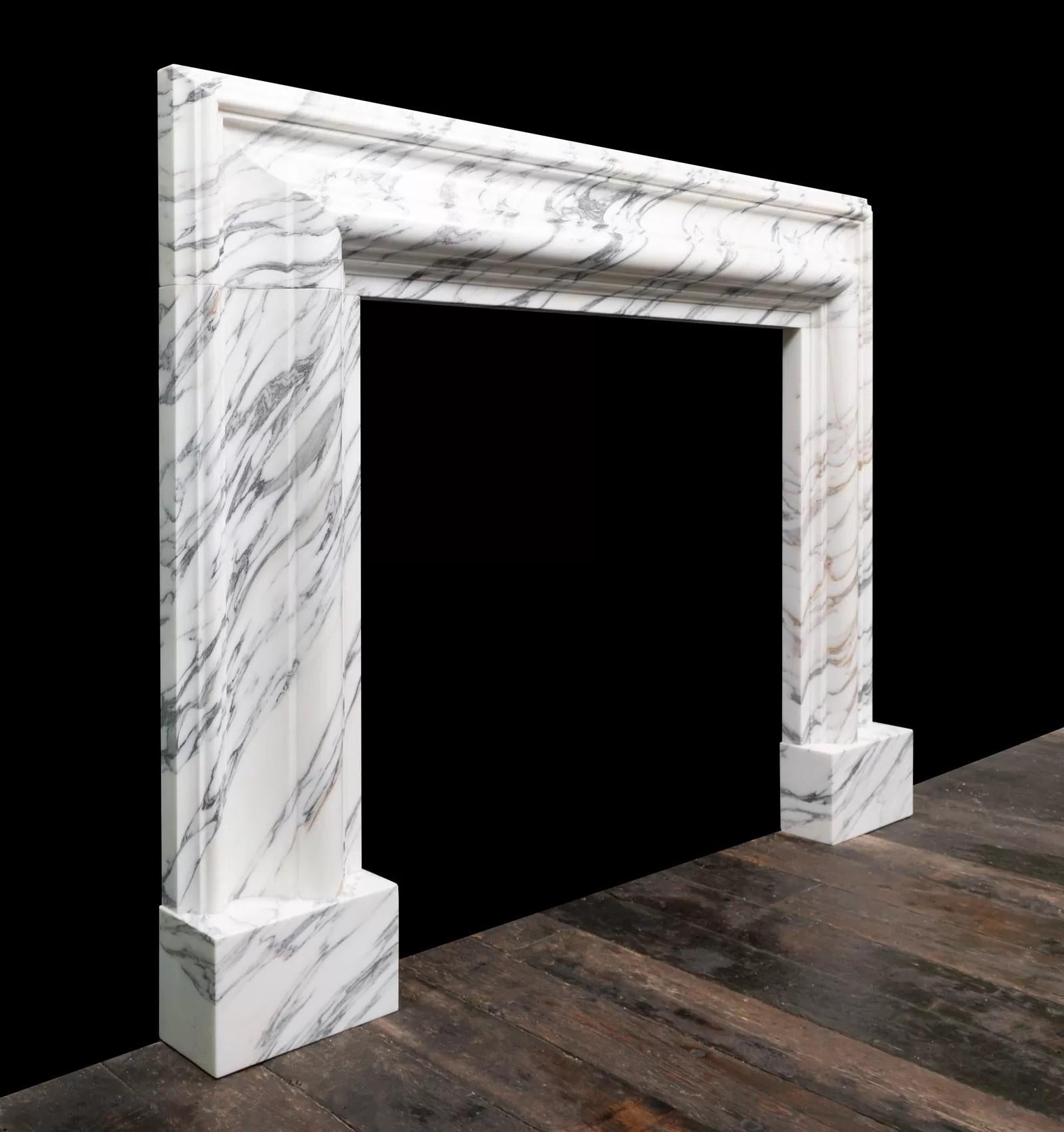 Northern Irish A large Arabescato marble bolection mantel by Ryan & Smith For Sale