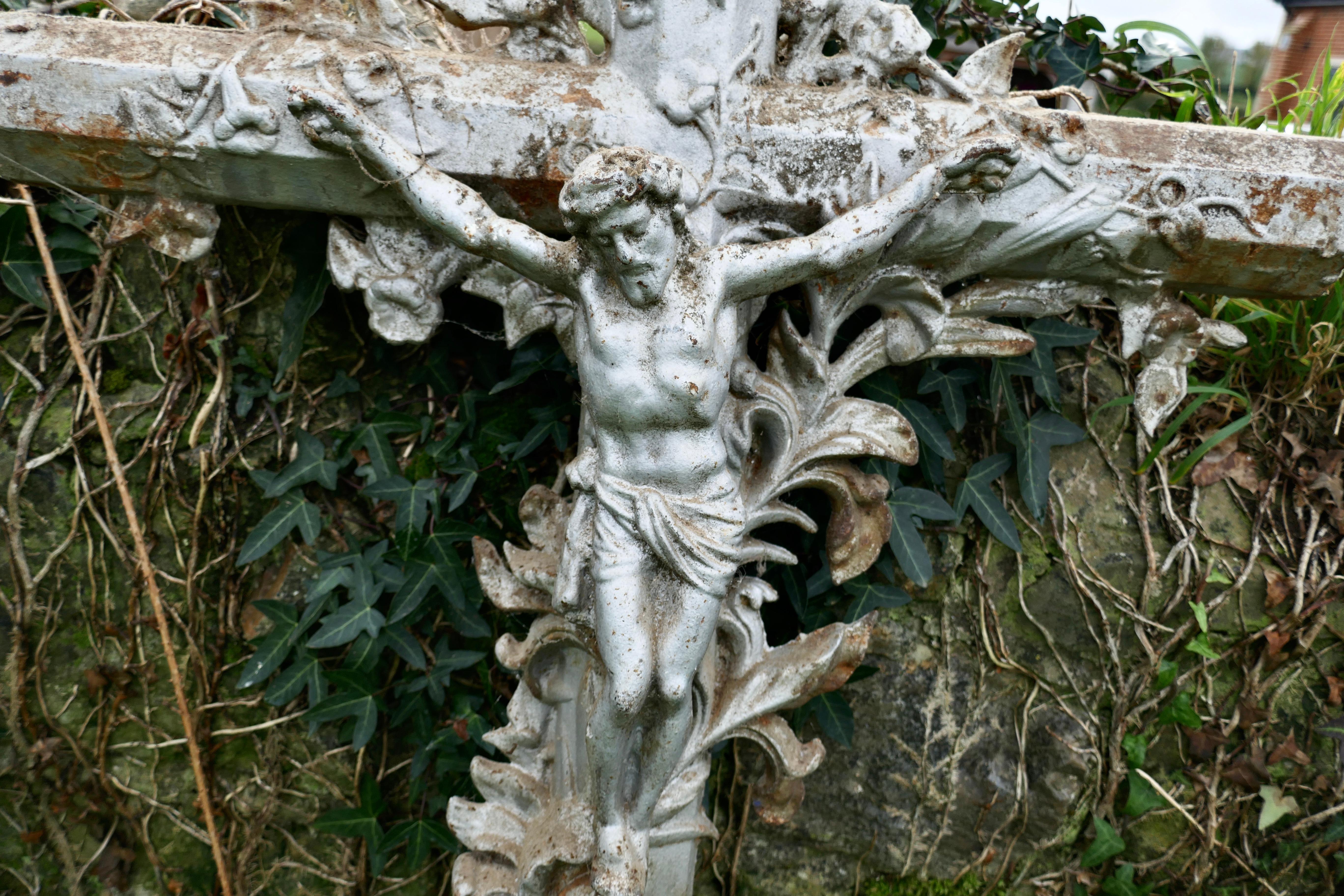 A large architectural French cast iron cross,

This magnificent antique cast iron cross from the church yard of a derelict country church in France. 
The cross would have been cast over 150 years ago and decorated with briars and thorns 
The