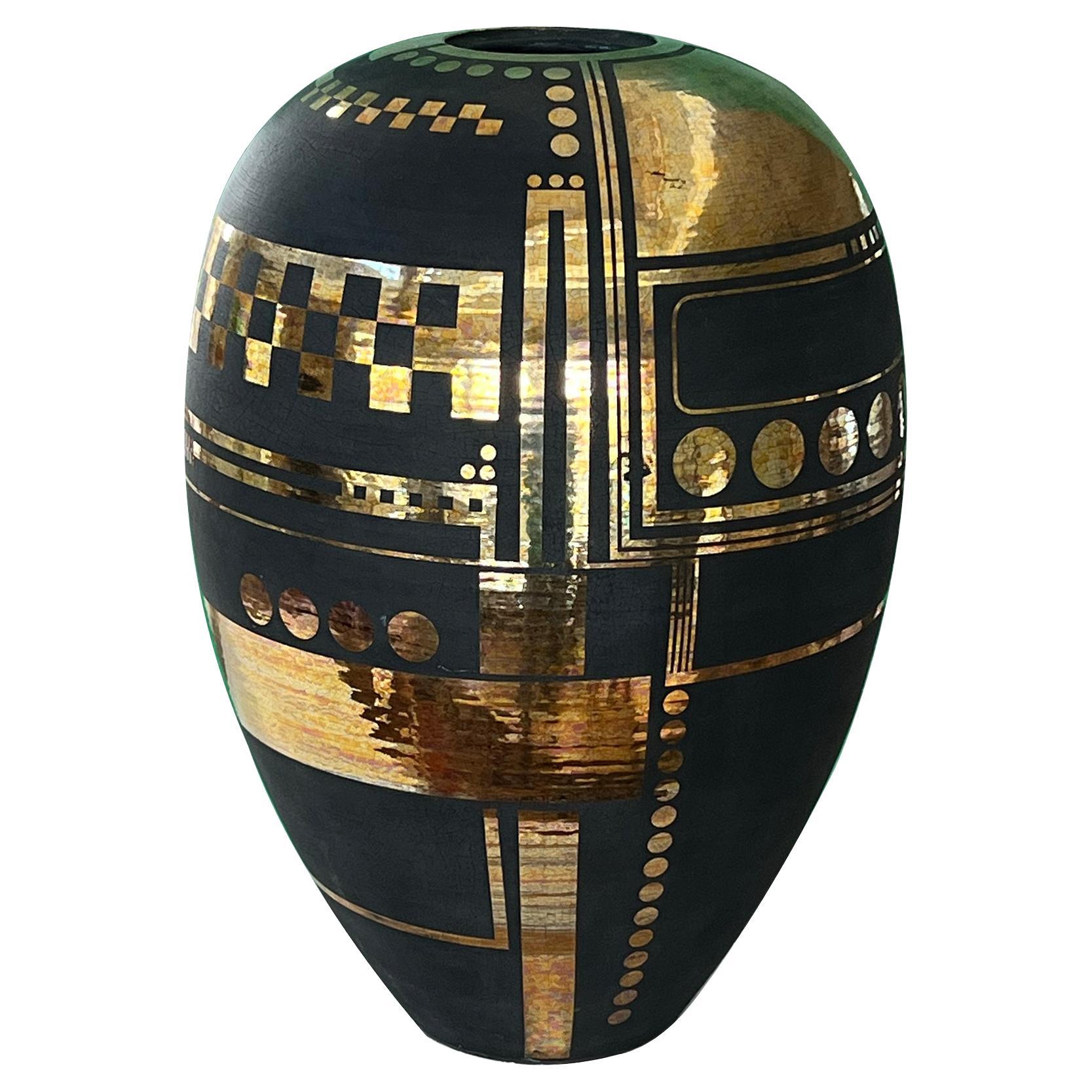 A Large Art Deco Style Black Glazed Ovoid Vase with Gilt Geometric Decoration