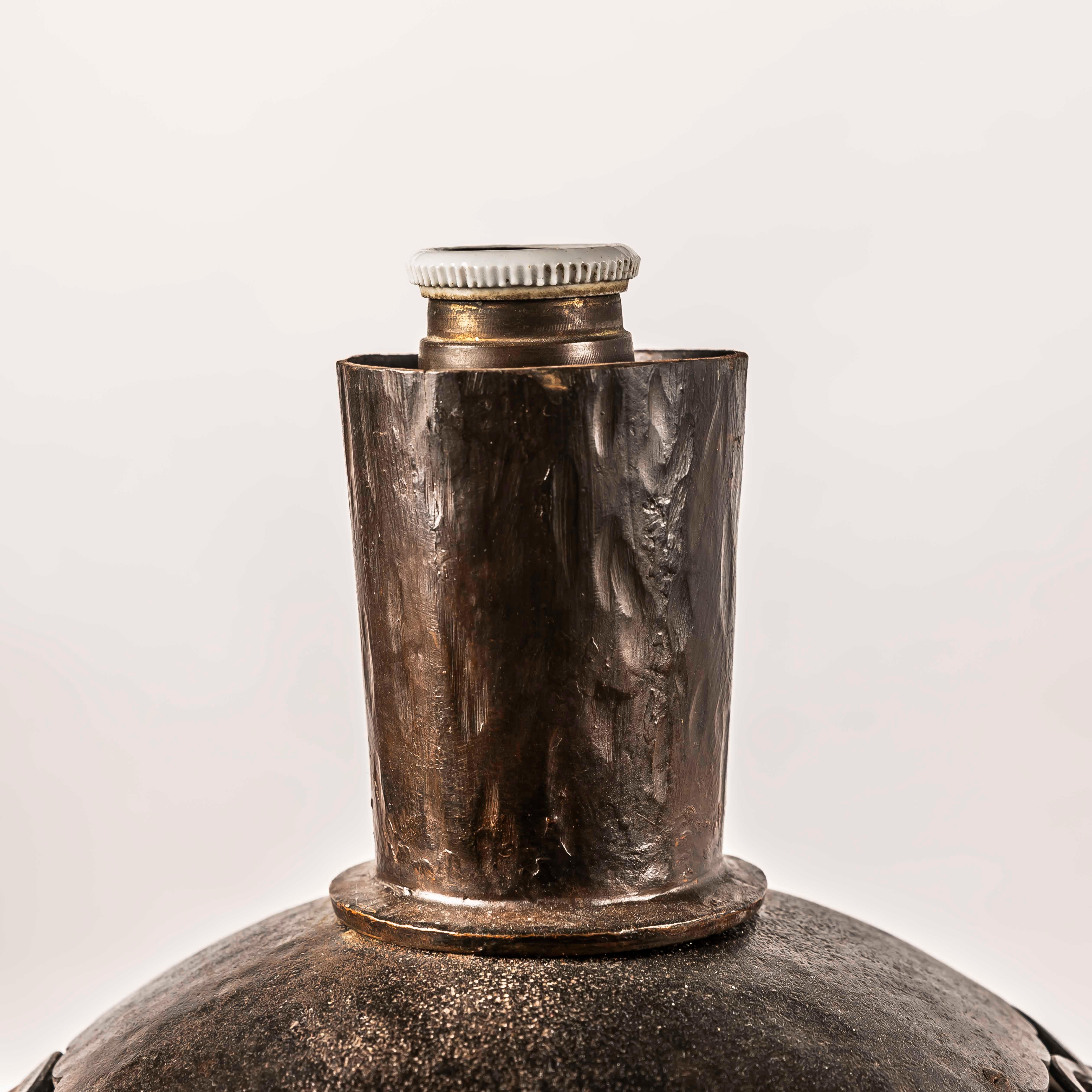 A large Art Deco wrough iron lamp designed by Edgar Brandt, Stamped 