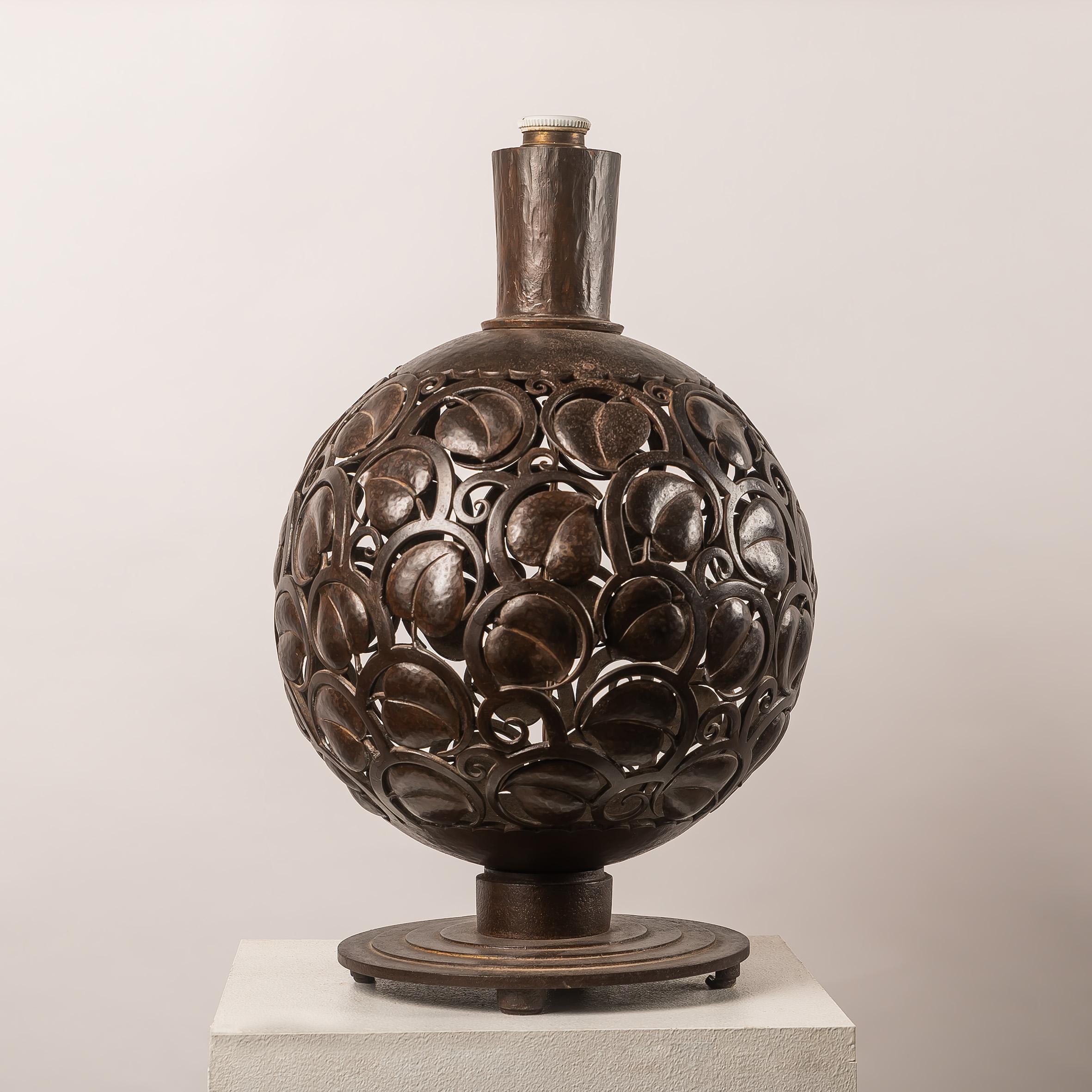 A large Art Deco wrough iron lamp designed by Edgar Brandt, Stamped 