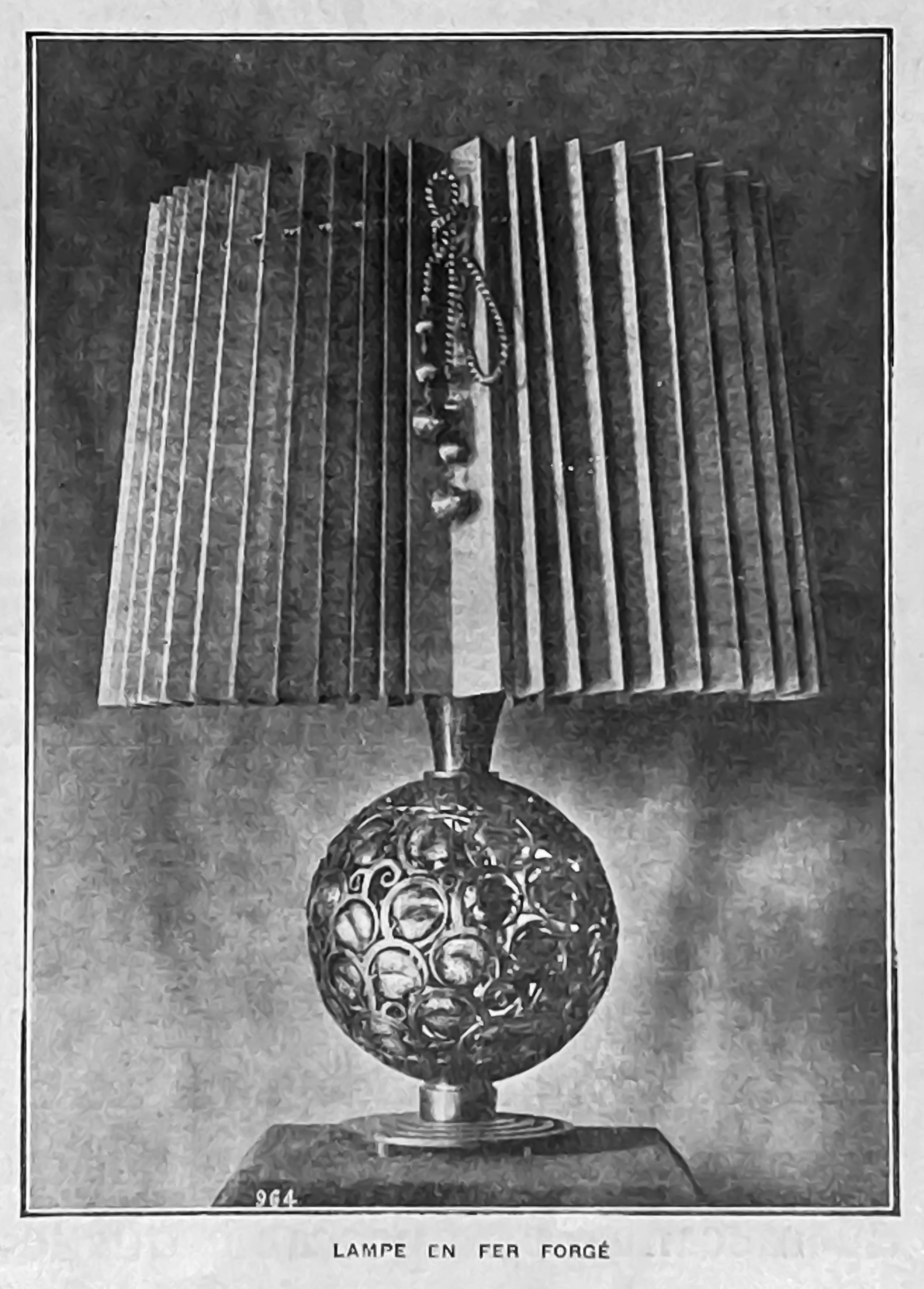 A large Art Deco wrough iron lamp designed by Edgar Brandt, Stamped 