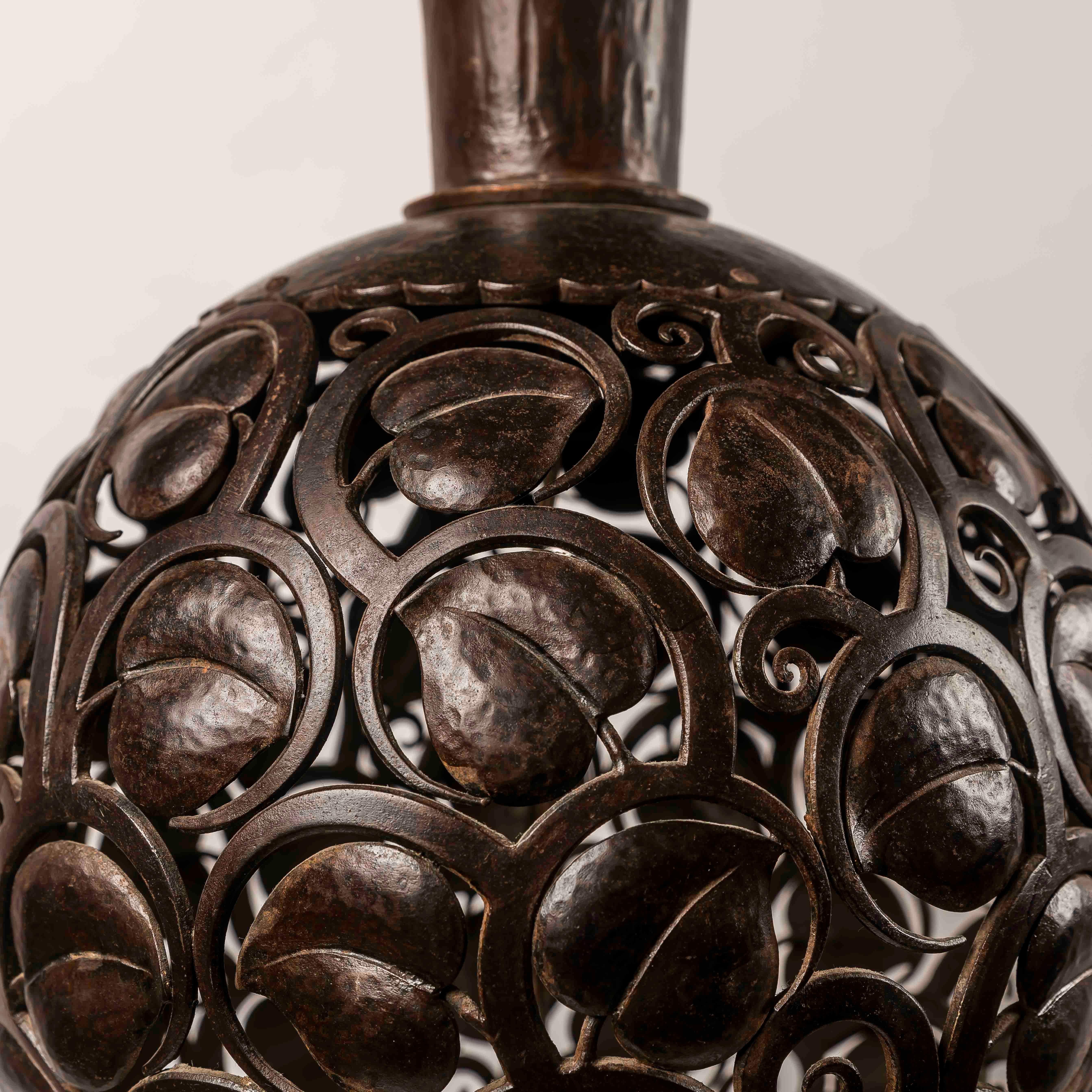 A large Art Deco wrough iron lamp designed by Edgar Brandt, Stamped 