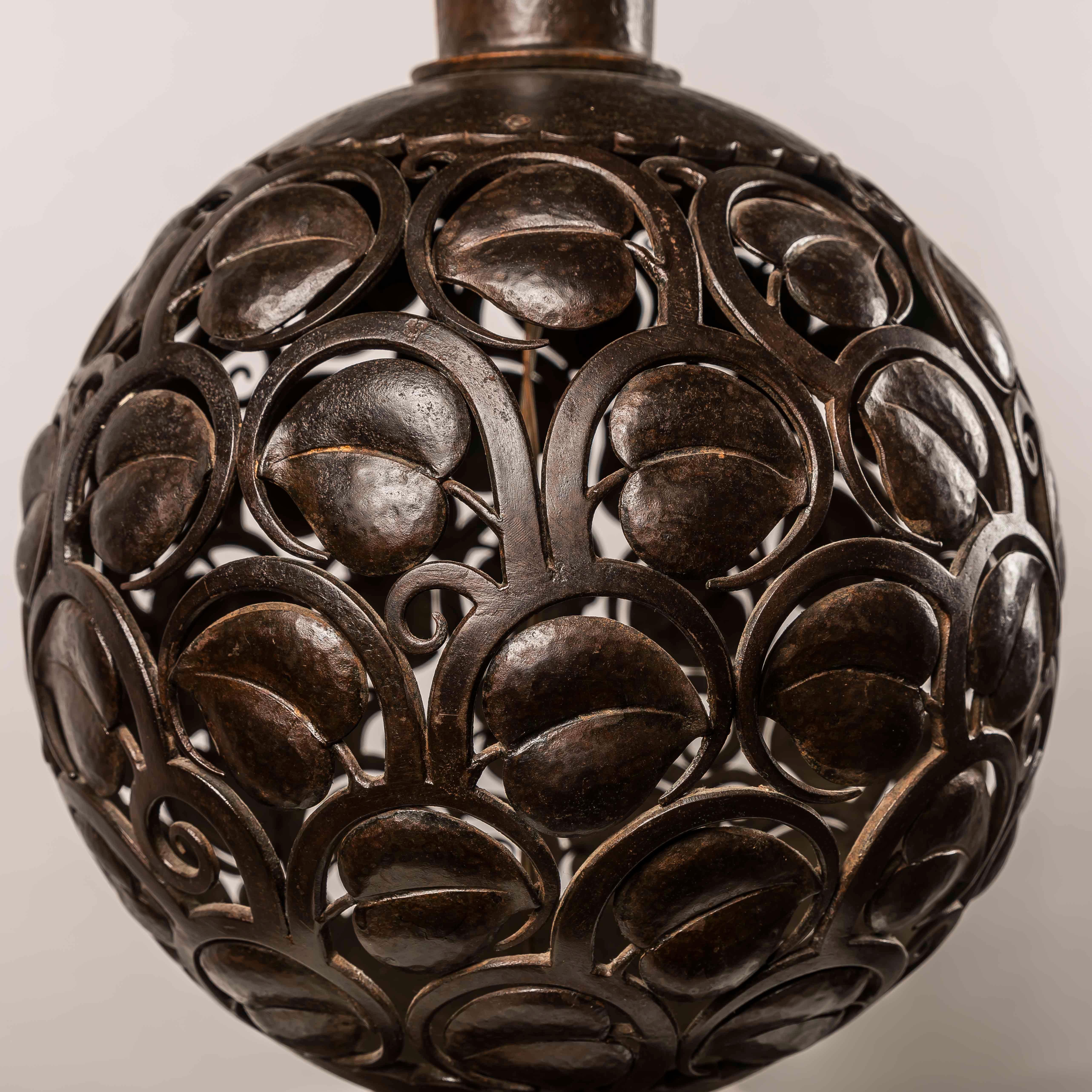A large Art Deco wrough iron lamp designed by Edgar Brandt, Stamped 