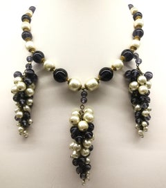 A large baroque pearl and glass bead three grape drop necklace, M Haskell, 1980s